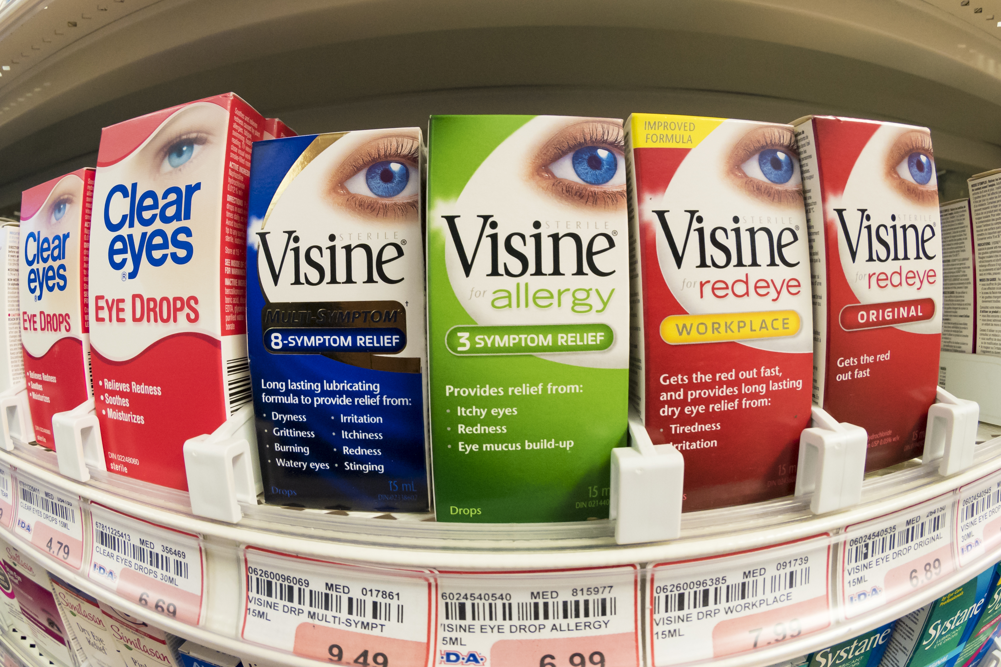Visine, over the counter eye drops in pharmacy shelf. Visine