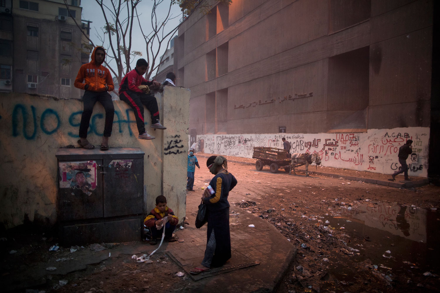 The following photographs were taken in Cairo in February 2012.<br><br>Egyptian children hang around following street clashes on Mohamed Mahmoud street next to Tahrir Square.