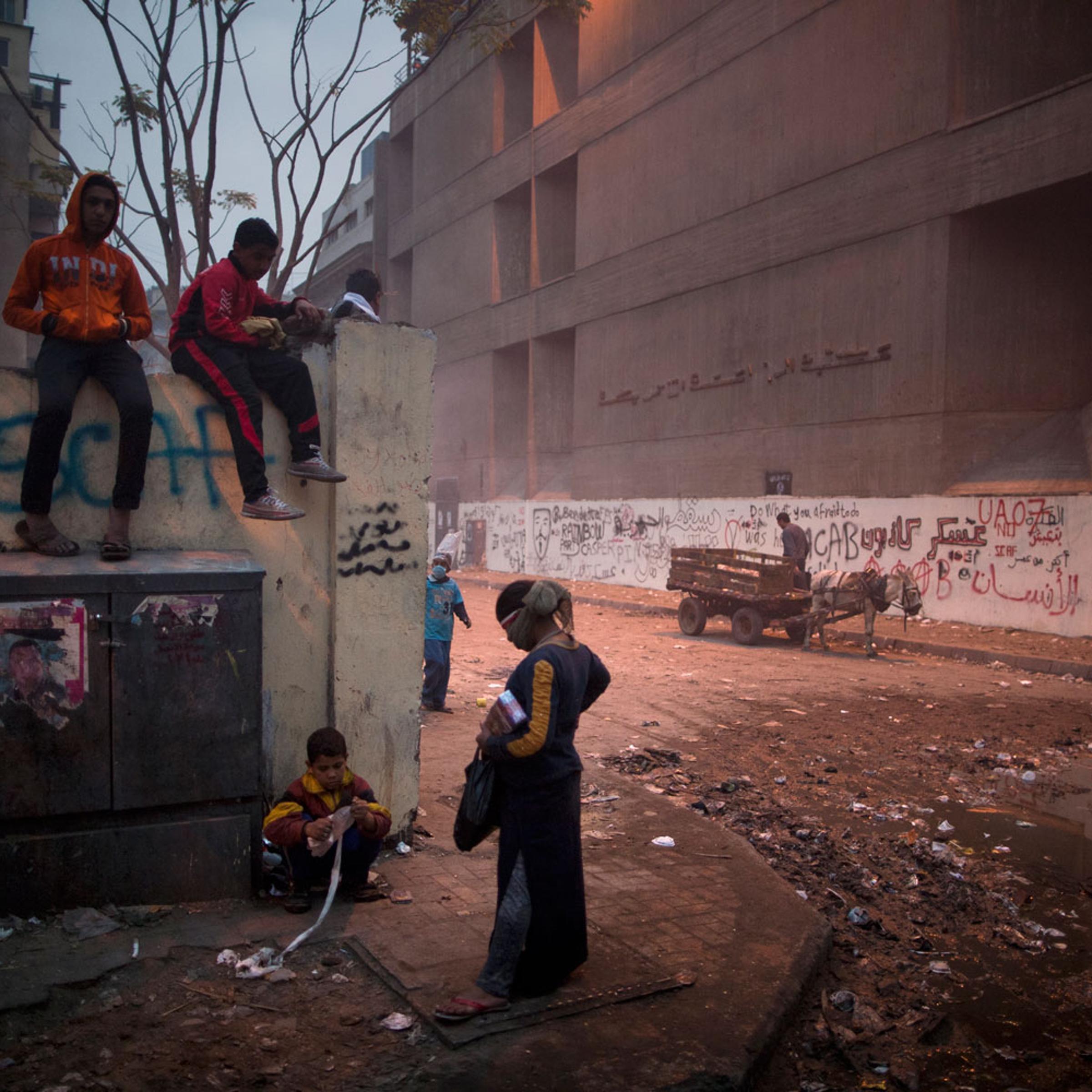 The following photographs were taken in Cairo in February 2012.<br><br>Egyptian children hang around following street clashes on Mohamed Mahmoud street next to Tahrir Square.