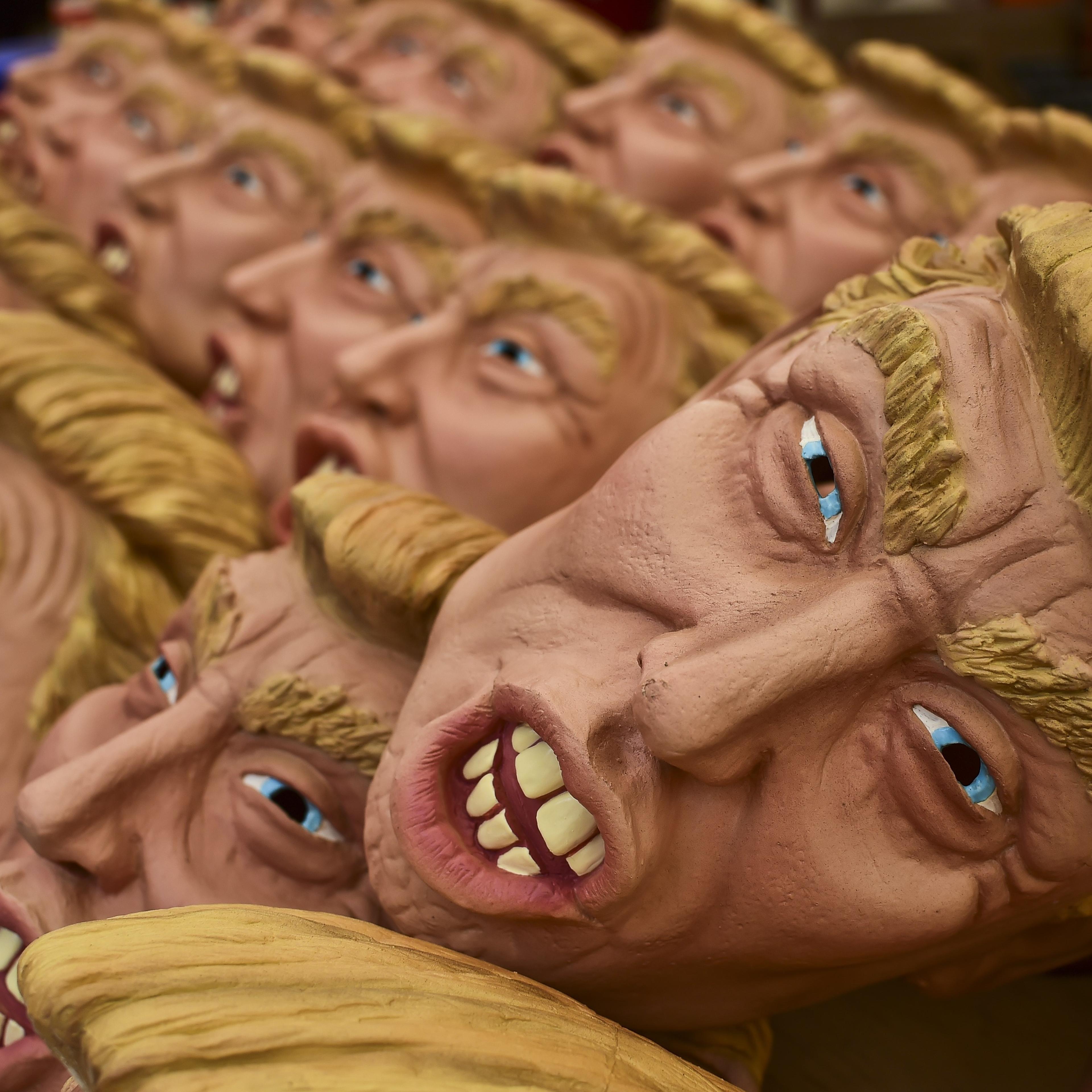 Masks representing Republican presidential candidate Donald Trump are pictured in a factory of costumes and masks, on Oct. 16, 2015, in Jiutepec, Morelos State.