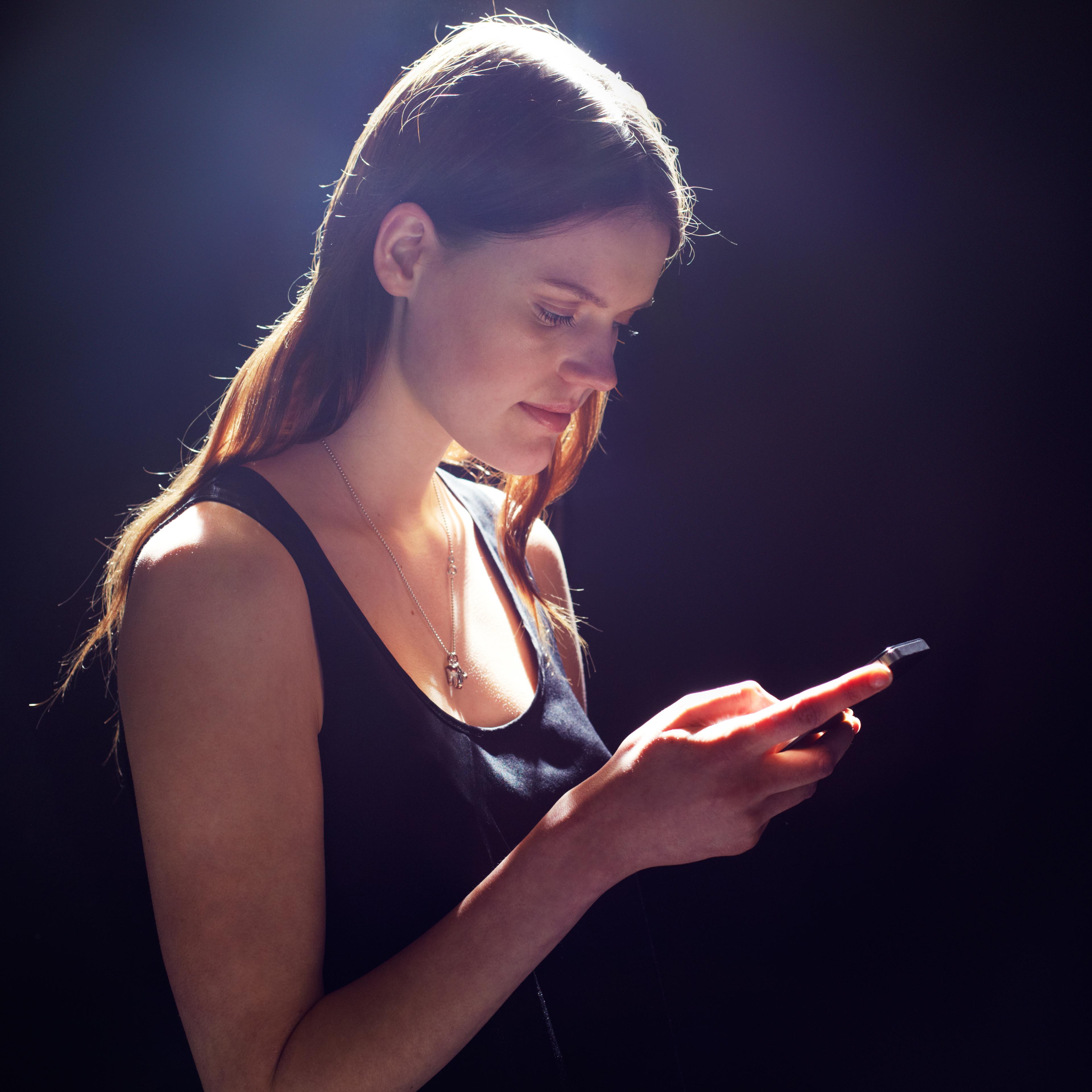 Young woman with smart phone.