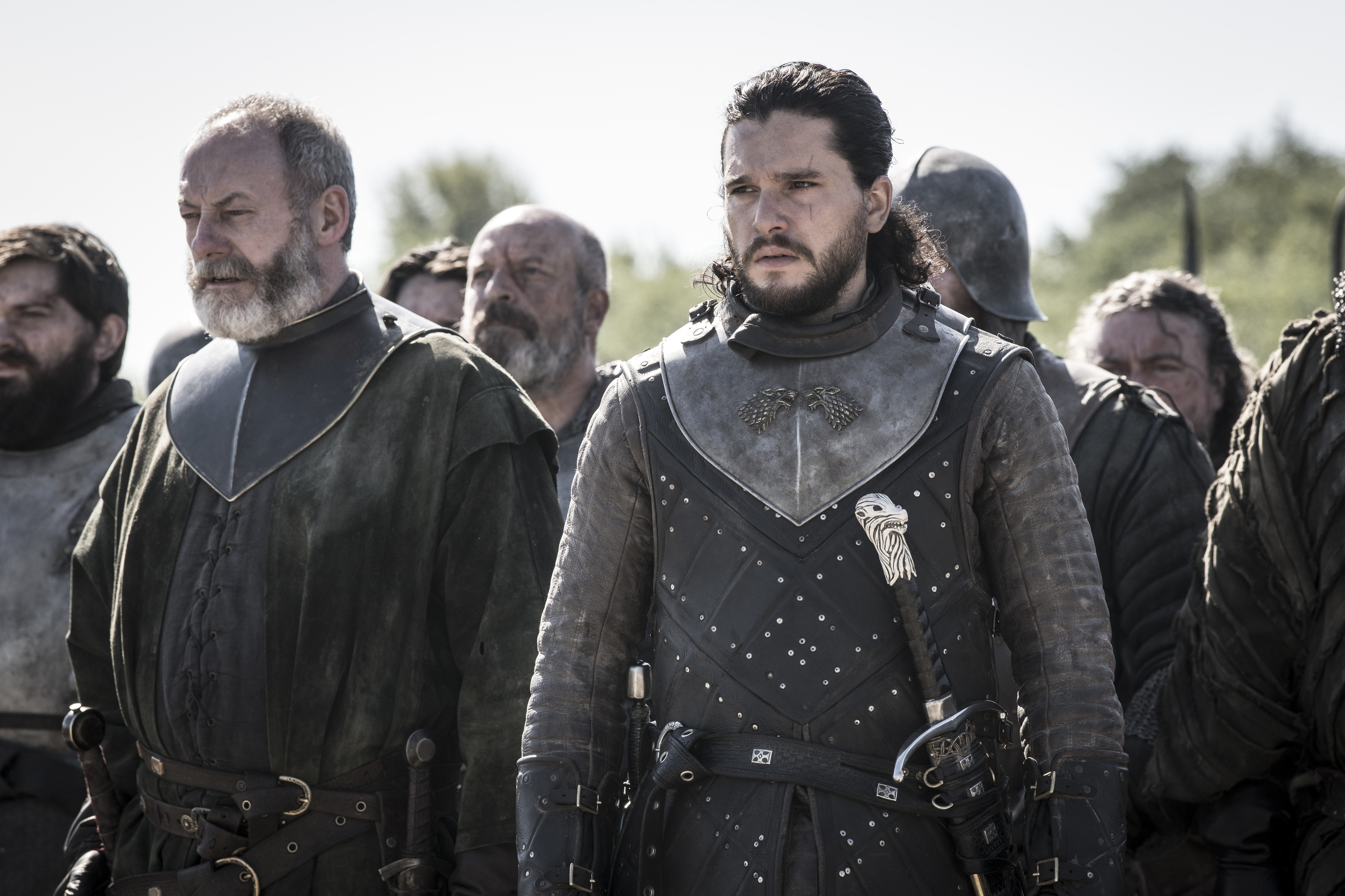 Liam Cunningham as Davos Seaworth and Kit Harington as Jon Snow.