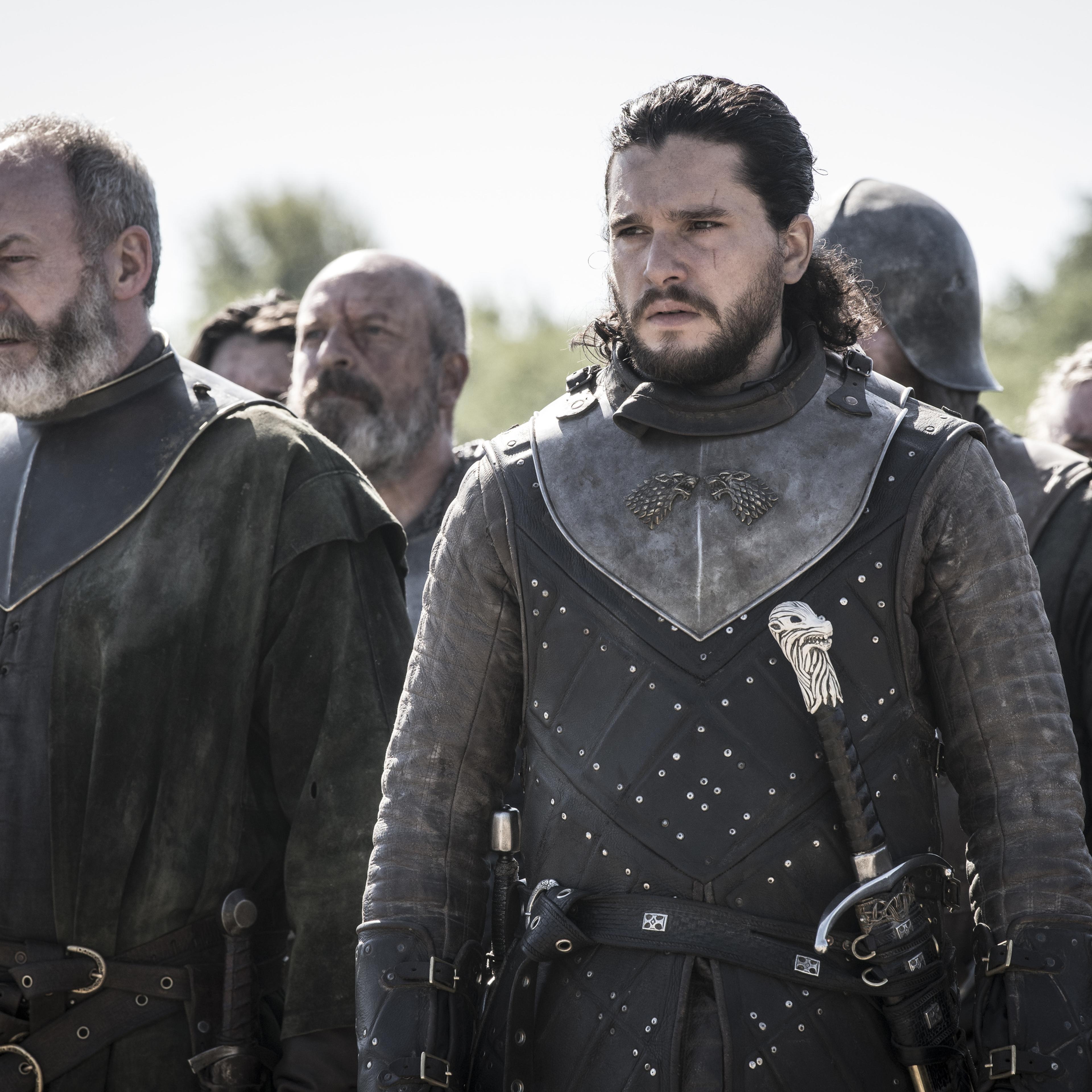 Liam Cunningham as Davos Seaworth and Kit Harington as Jon Snow.