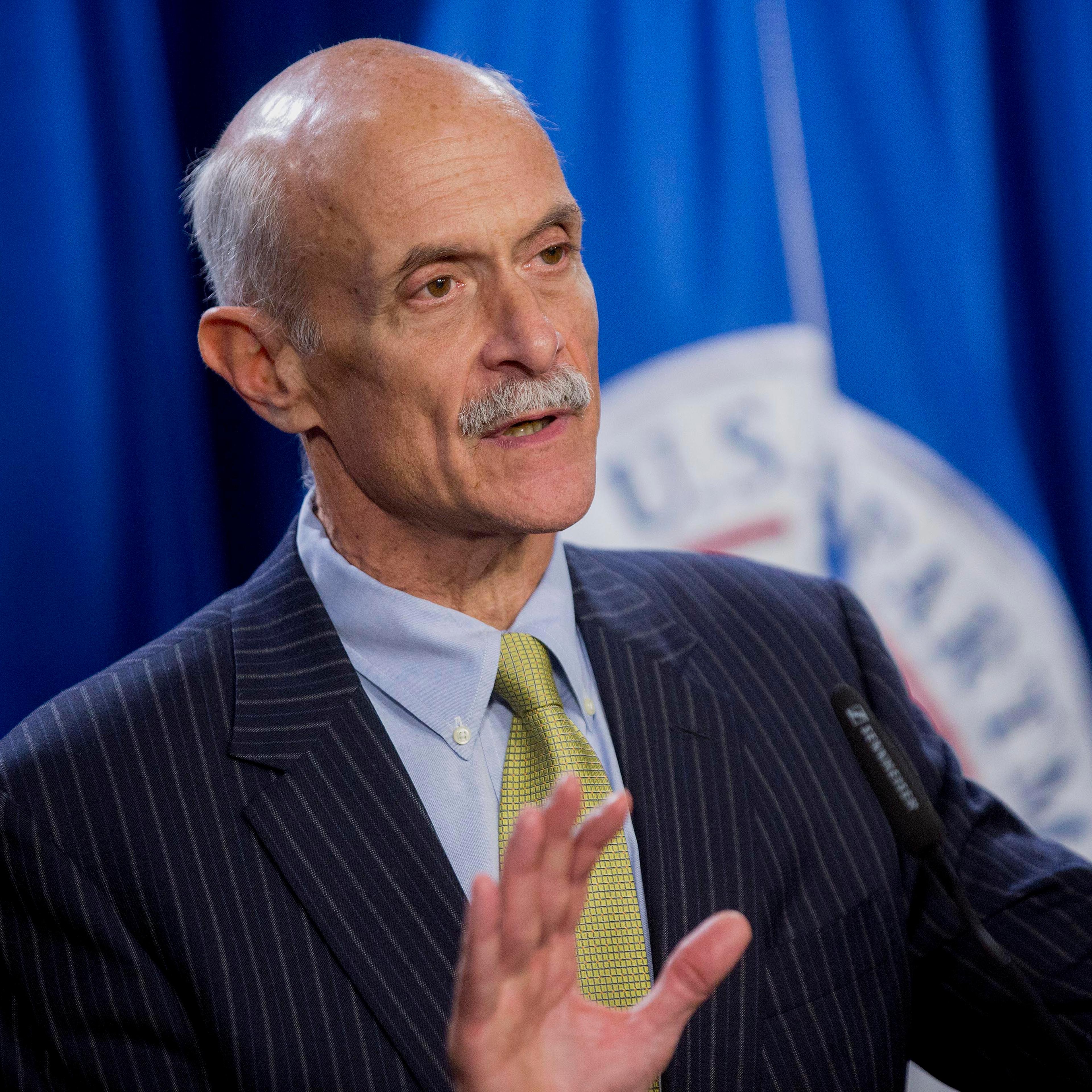 Michael Chertoff, former U.S. secretary of Homeland Security (DHS), speaks during a news conference with Jeh Johnson, U.S. secretary of Homeland Security (DHS), and former secretaries of Homeland Security Tom Ridge, not pictured, at the U.S. Immigration