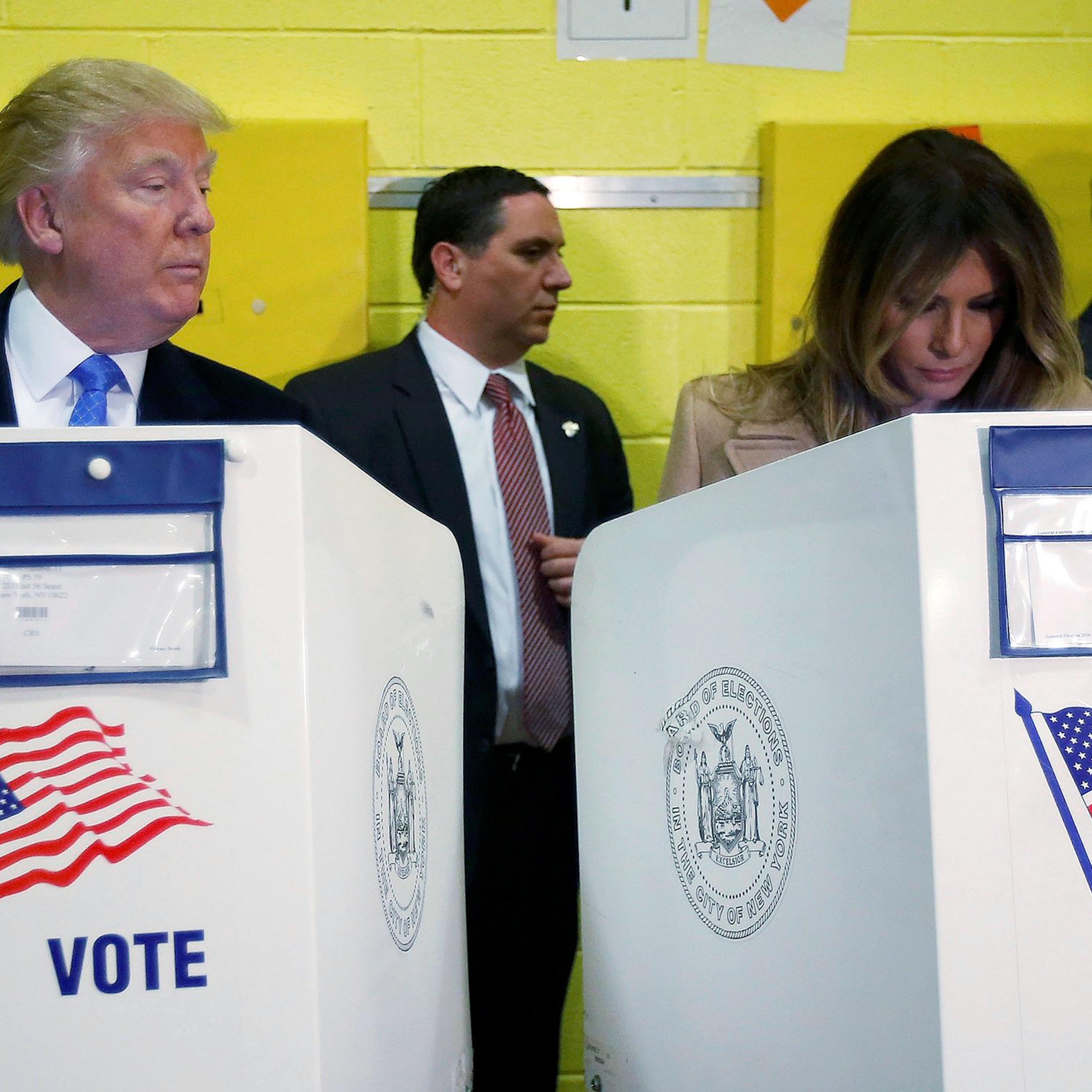 Republican presidential nominee Donald Trump and his wife Melania Trump vote at PS 59 in New York, New York, U.S. November 8, 2016. REUTERS/Carlo Allegri