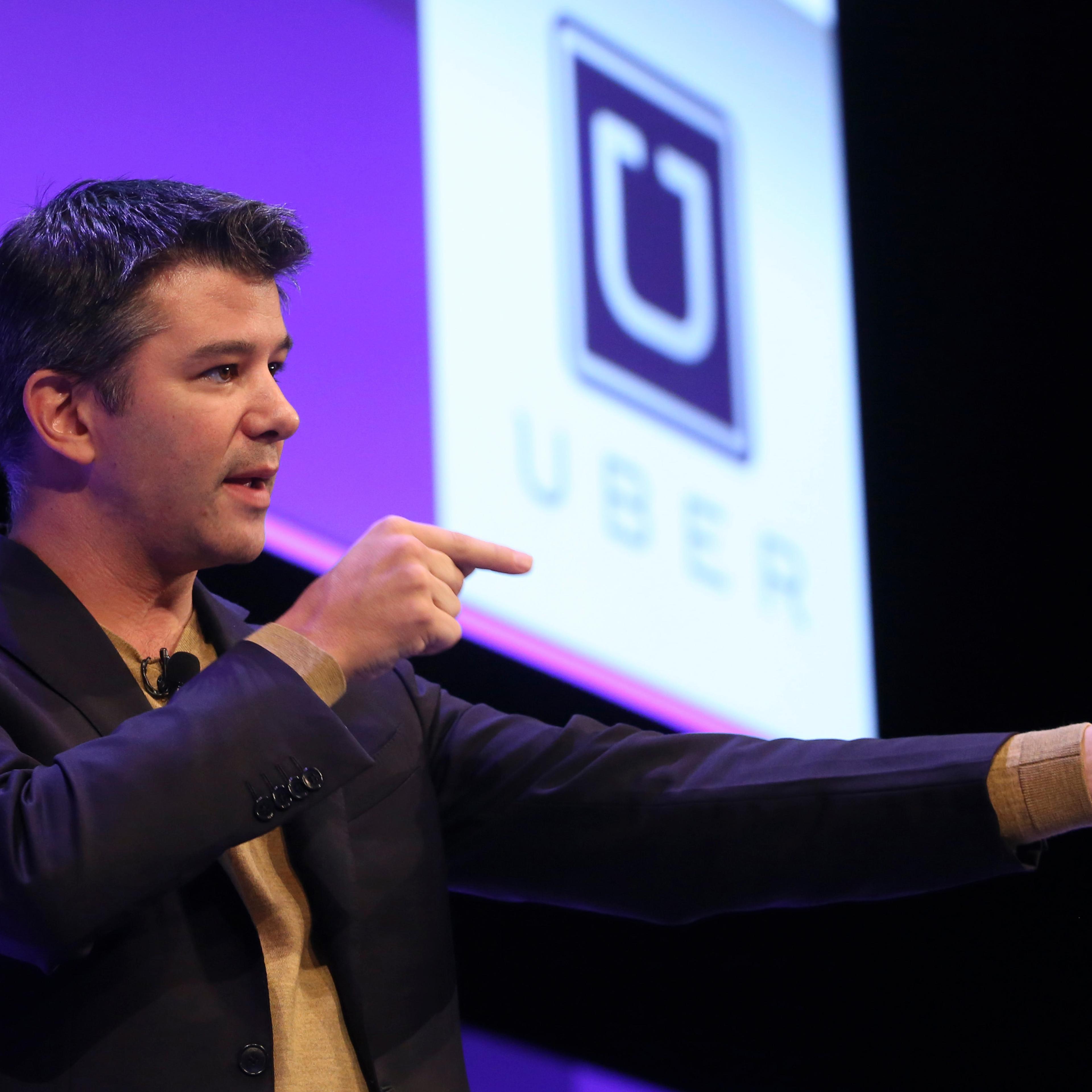 Travis Kalanick, chief executive officer of Uber Technologies Inc., gestures as he speaks during the Institute of Directors (IOD) annual convention at the Royal Albert Hall in London, U.K., on Oct. 3, 2014.