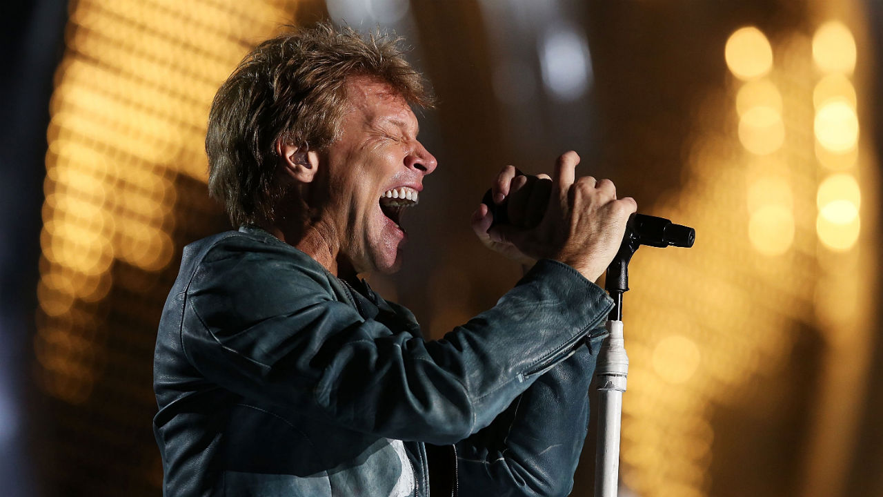 Jon Bon Jovi of Bon Jovi performs live for fans at Etihad Stadium on the first show of his 2013 Australian Tour on December 7, 2013 in Melbourne, Australia.