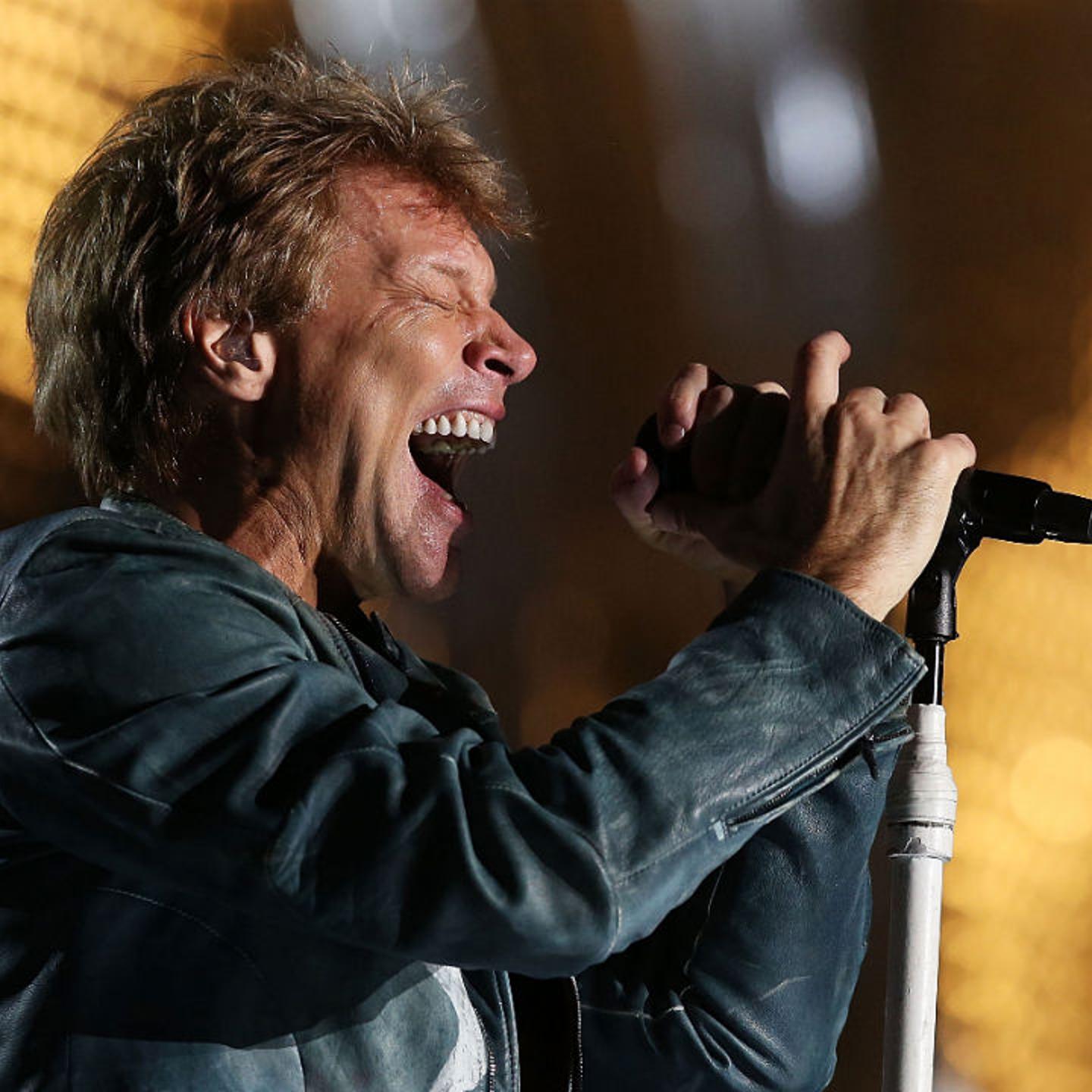 Jon Bon Jovi of Bon Jovi performs live for fans at Etihad Stadium on the first show of his 2013 Australian Tour on December 7, 2013 in Melbourne, Australia.