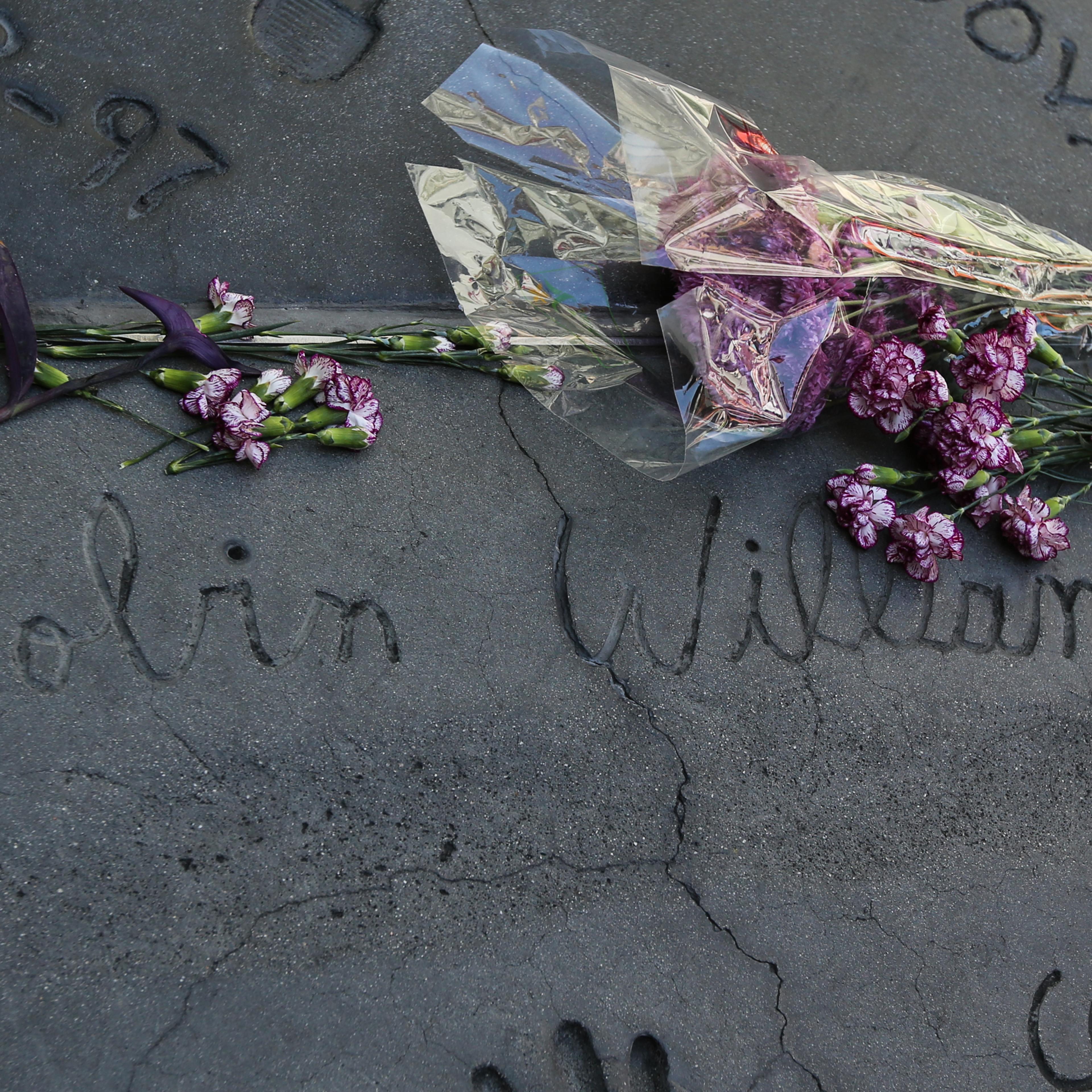Sad Goodbye: Where Robin Williams once stood, flowers now lay