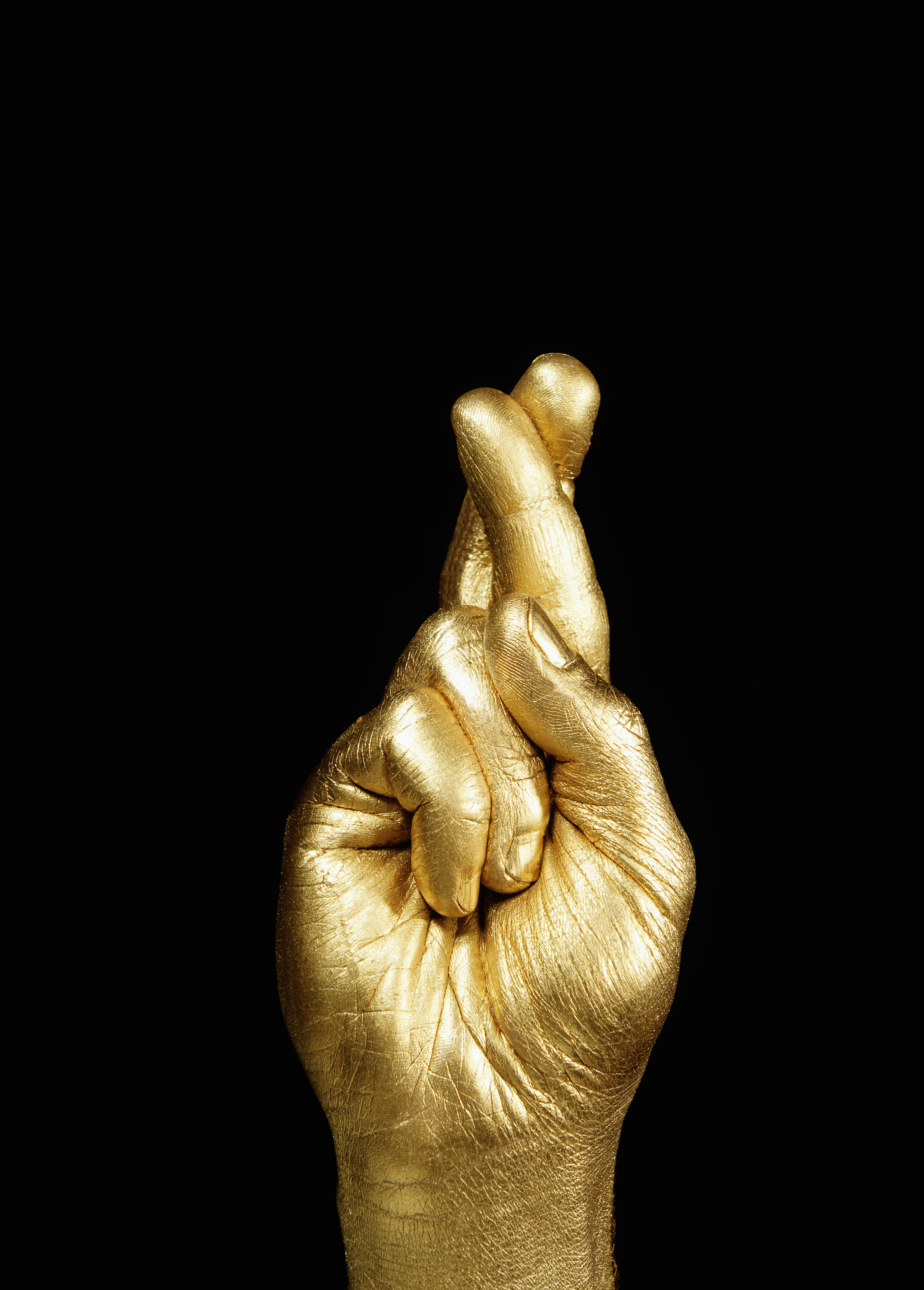 fingers-crossed-gold