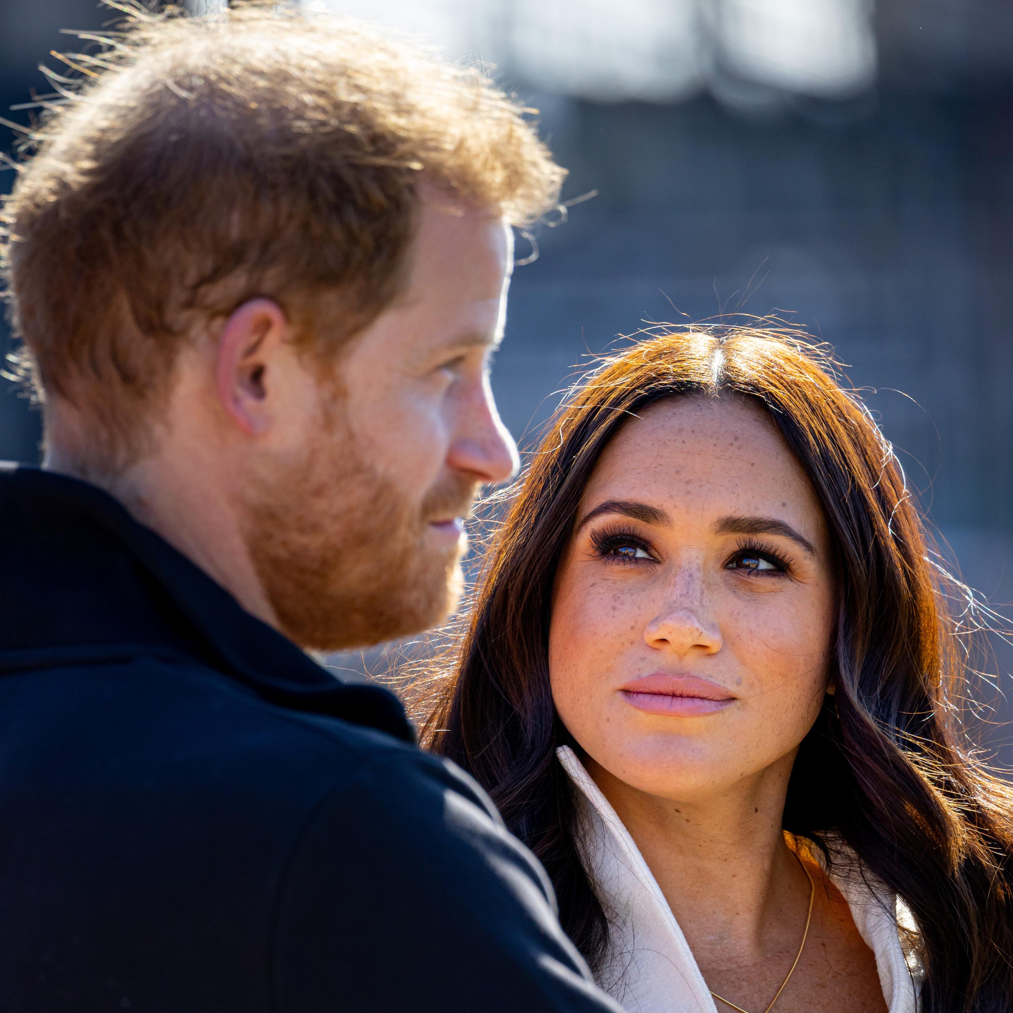 Prince Harry, Duke of Sussex and Meghan, Duchess of Sussex attend day two of the Invictus Games 2020 at Zuiderpark on April 17, 2022 in The Hague, Netherlands.