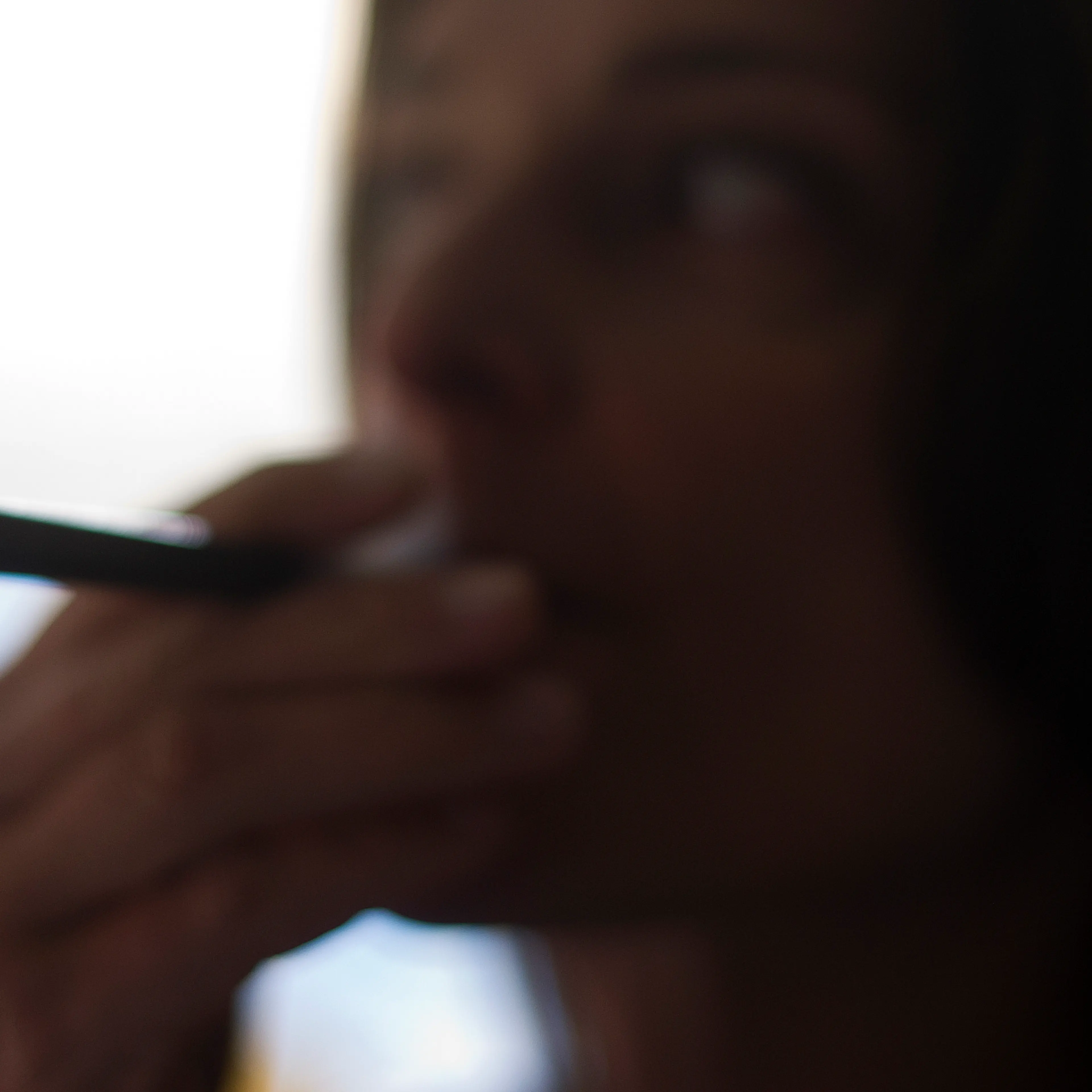 A woman smokes a "Blu" e-cigarette in Washington, D.C., on Sept. 25, 2013.