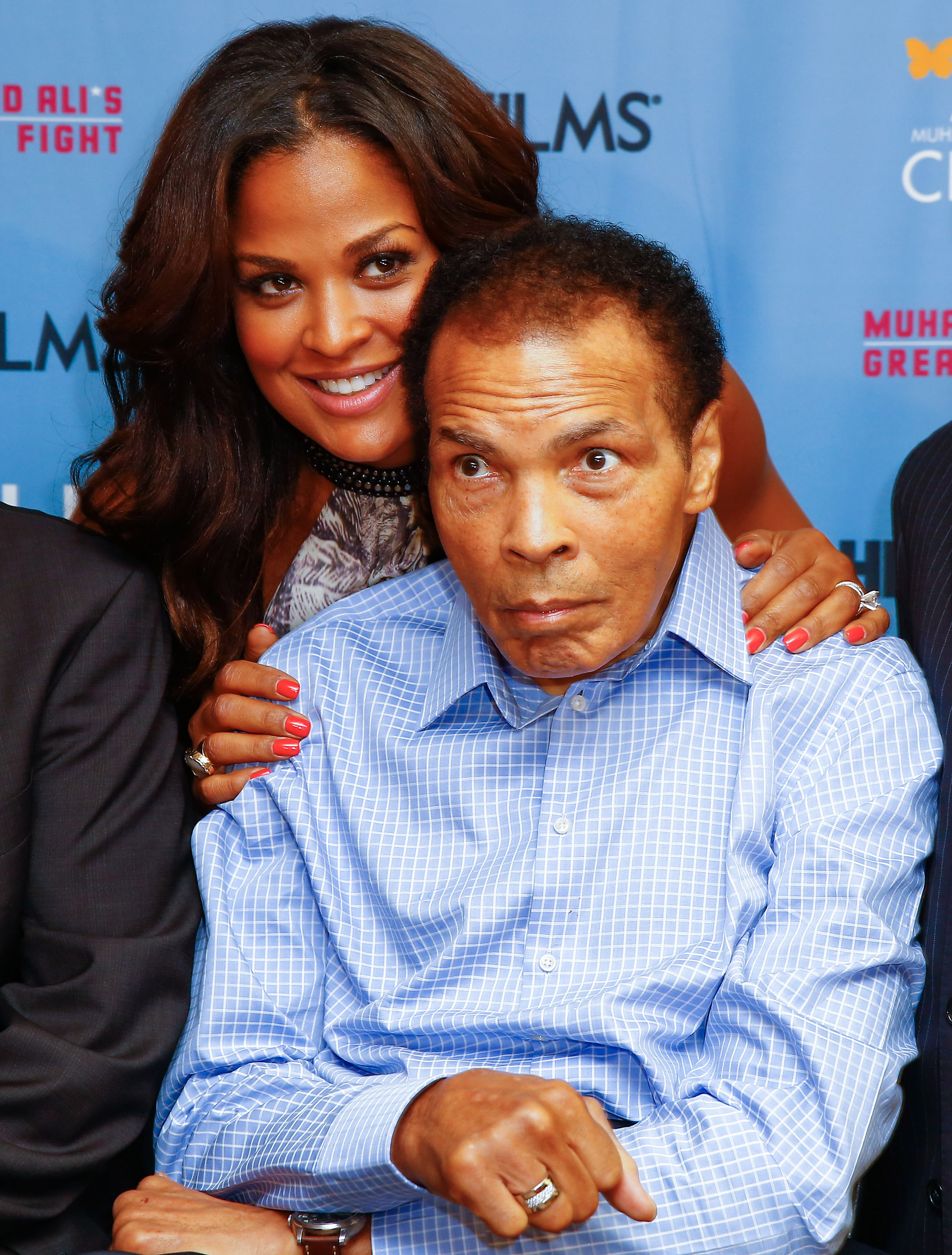 Laila Ali and Muhammad Ali appear at HBO Films and the Muhammad Ali Center to co-host the U.S. Premiere of "Muhammad Ali's Greatest Fight" in Louisville, Kentucky, on Oct. 2, 2013.