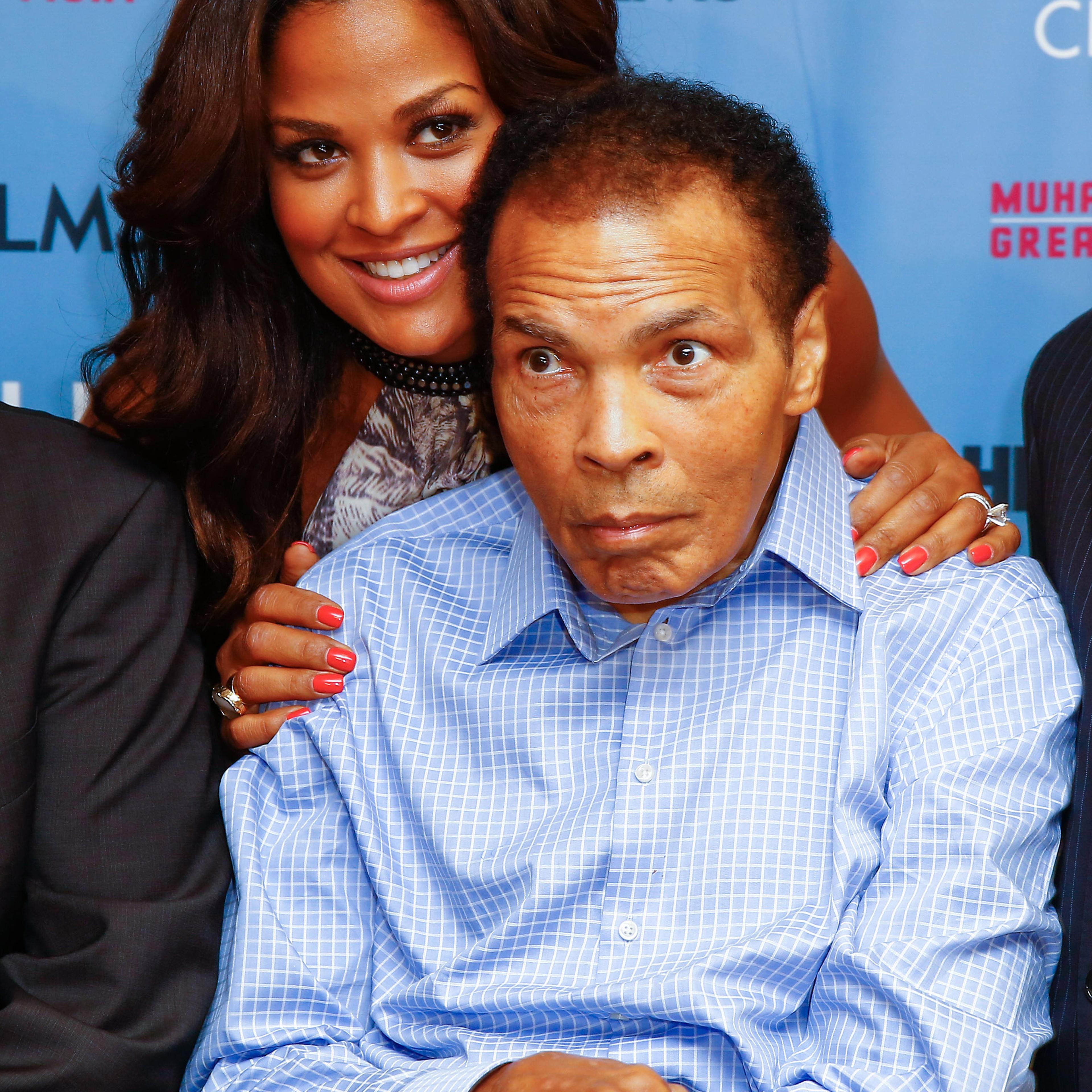 Laila Ali and Muhammad Ali appear at HBO Films and the Muhammad Ali Center to co-host the U.S. Premiere of "Muhammad Ali's Greatest Fight" in Louisville, Kentucky, on Oct. 2, 2013.