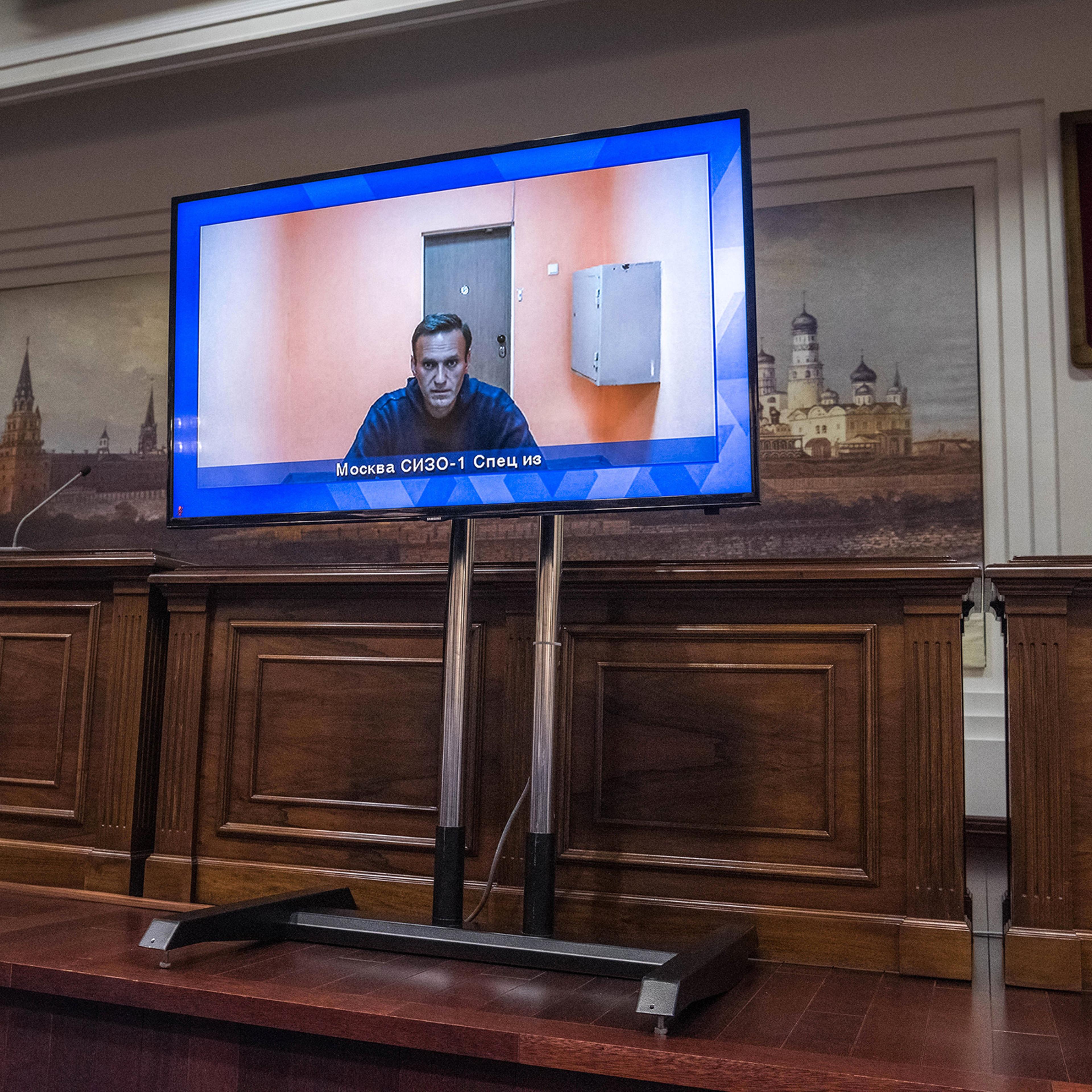 Russian opposition leader Alexei Navalny appears via video link for a court hearing, in which it was directed that he remain imprisoned, in Moscow on Jan. 28, 2021.