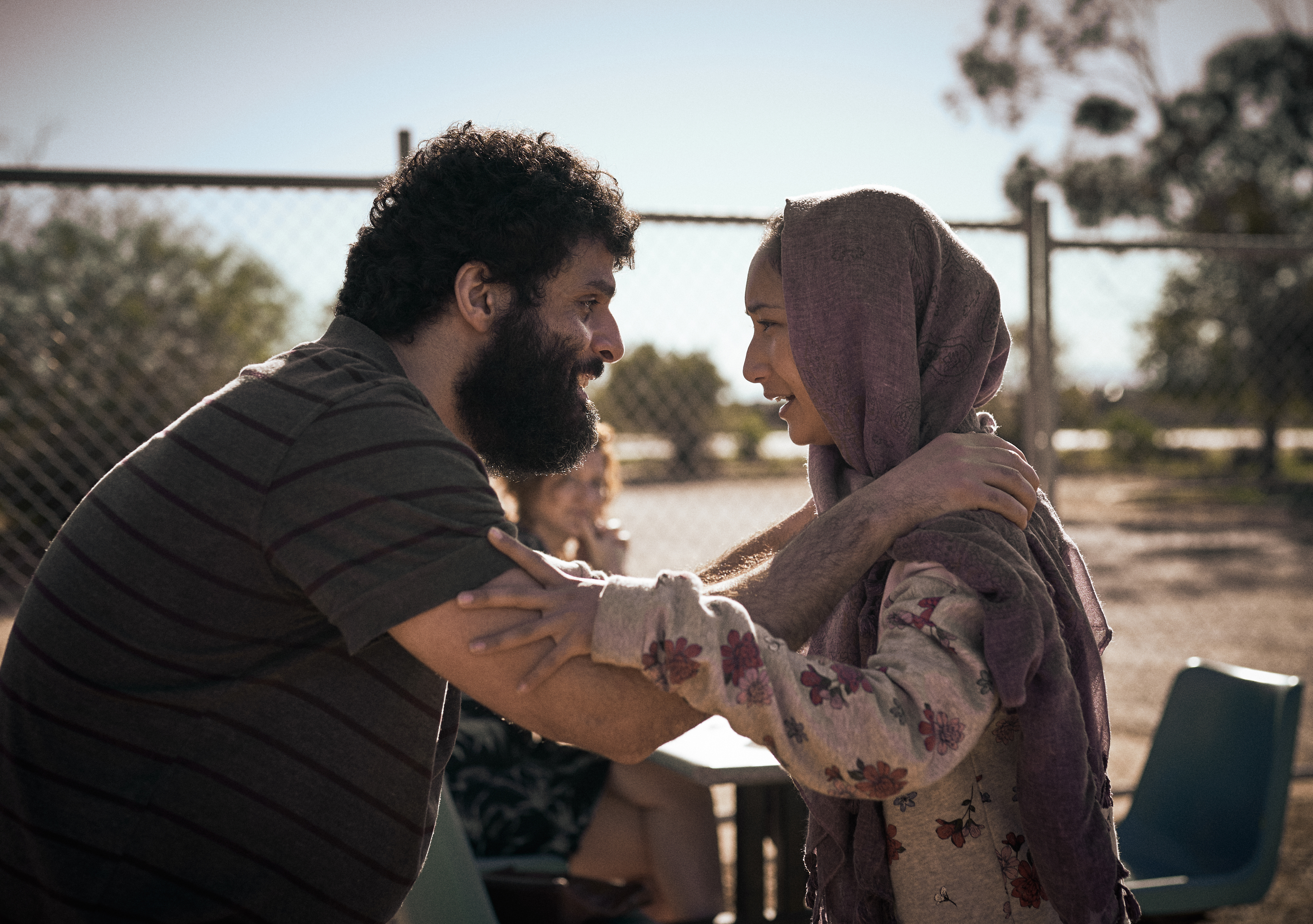 STATELESS (L to R) FAYSSAL BAZZI as AMEER and SORAYA HEIDARI as MINA in episode 102 of STATELESS Cr. BEN KING/NETFLIX © 2020