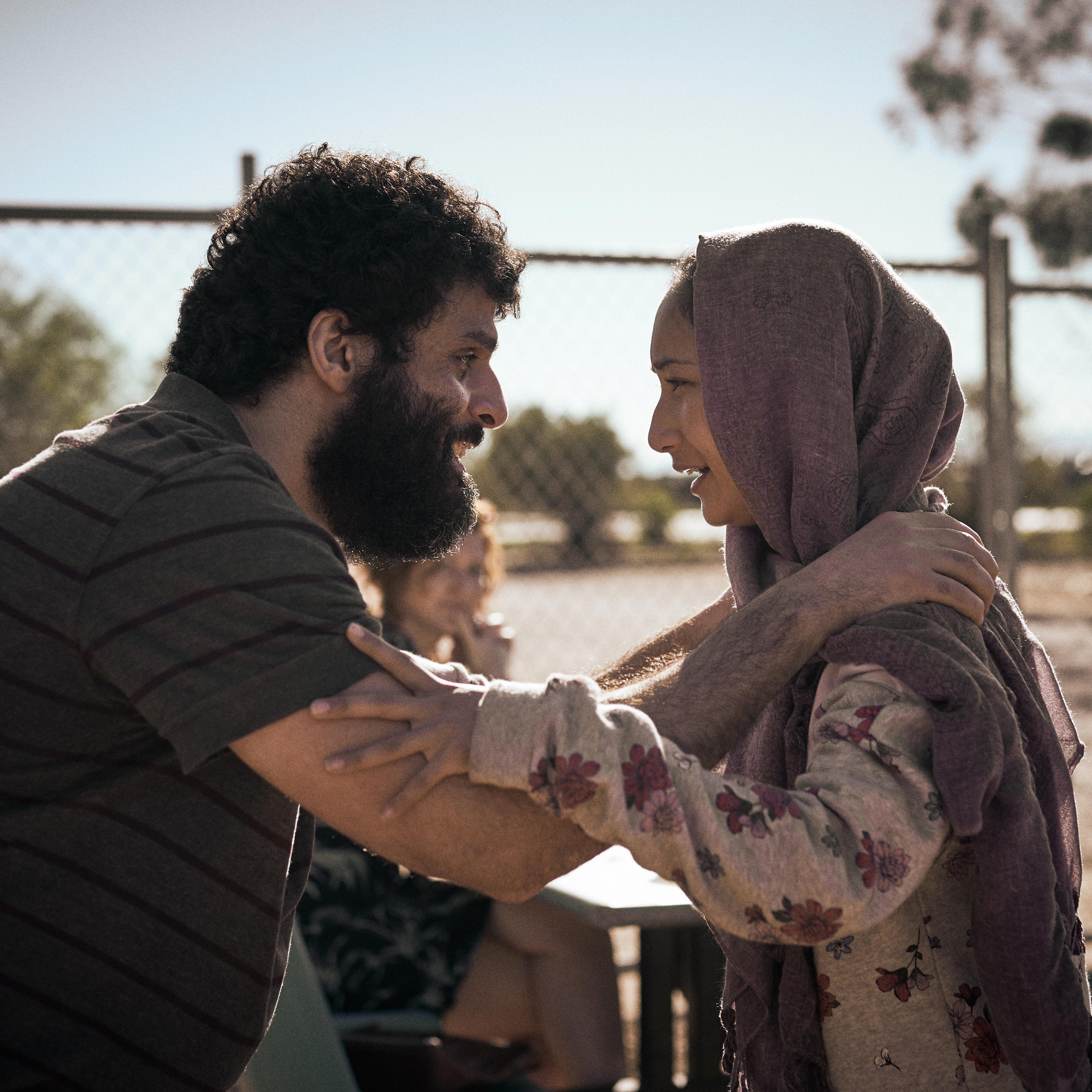 STATELESS (L to R) FAYSSAL BAZZI as AMEER and SORAYA HEIDARI as MINA in episode 102 of STATELESS Cr. BEN KING/NETFLIX © 2020