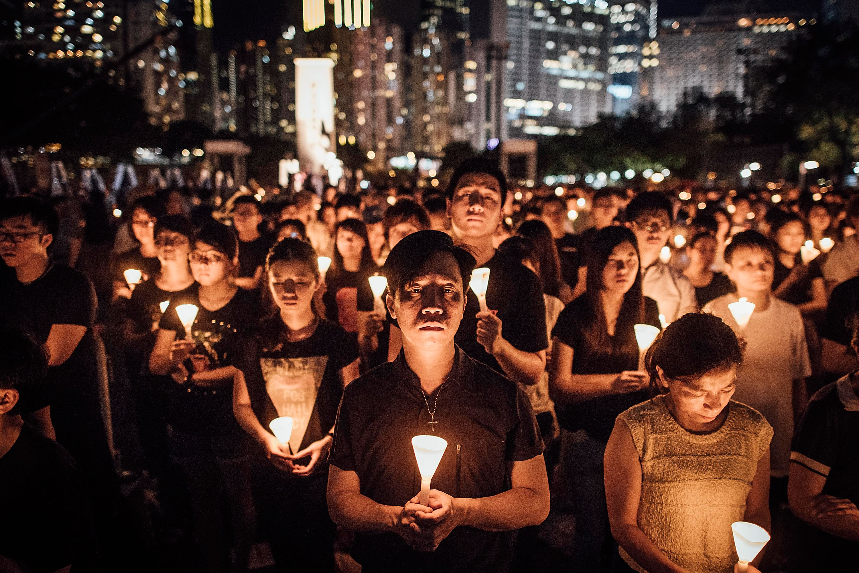 <> at Victoria Park on June 4, 2015 in Causeway Bay, Hong Kong. Hong Kong residents held a candlelight vigil as it marks 26th anniversary of 1989 student-led Tiananmen Square protest.