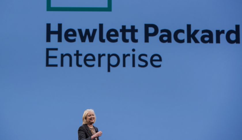 Meg Whitman, chief executive officer of Hewlett-Packard Co., speaks with the new Hewlett Packard Enterprise logo on the screen, during the HP Discover 2015 conference in Las Vegas, Nevada, U.S., on Tuesday, June 2, 2015. Hewlett-Packard Co. reported fisc