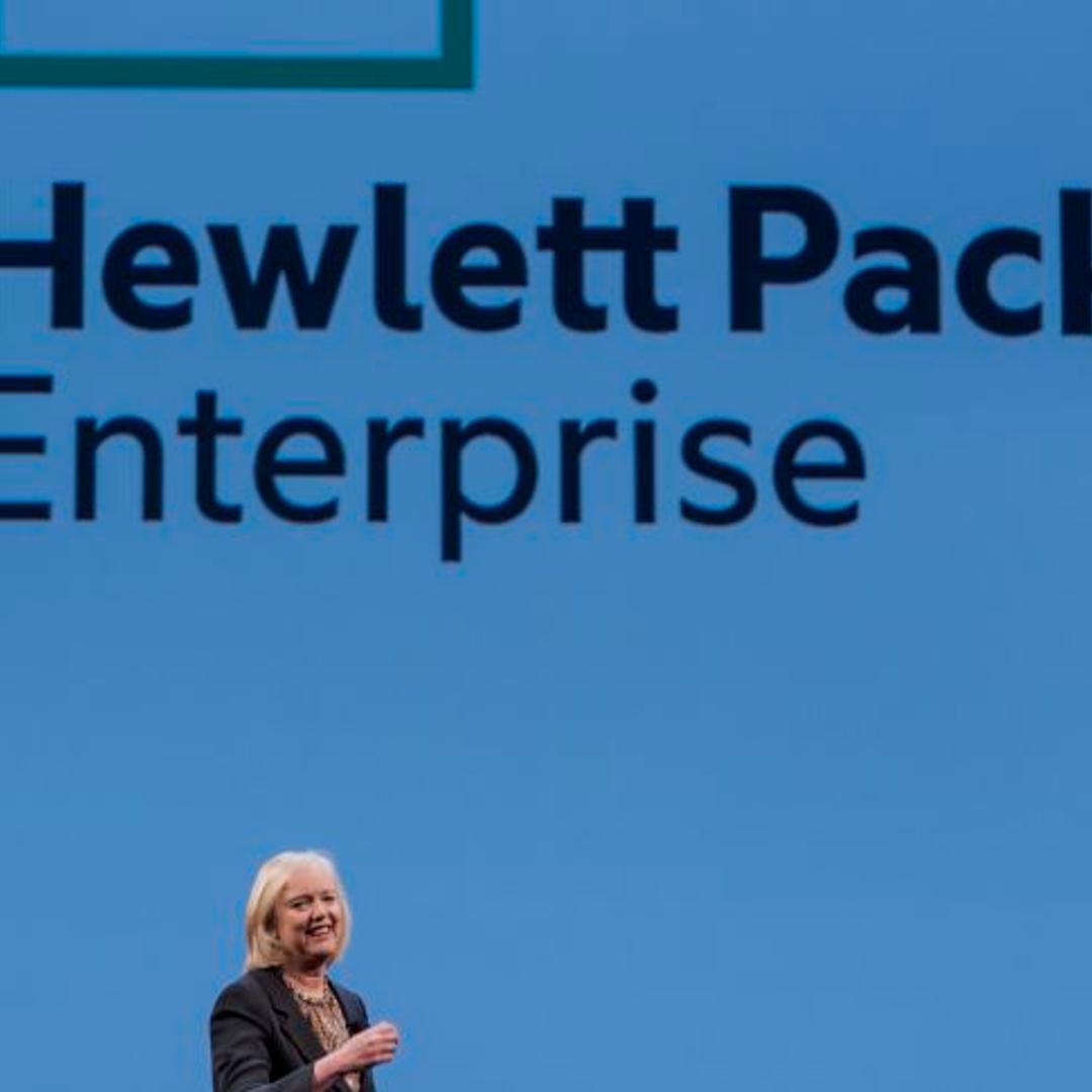 Meg Whitman, chief executive officer of Hewlett-Packard Co., speaks with the new Hewlett Packard Enterprise logo on the screen, during the HP Discover 2015 conference in Las Vegas, Nevada, U.S., on Tuesday, June 2, 2015. Hewlett-Packard Co. reported fisc