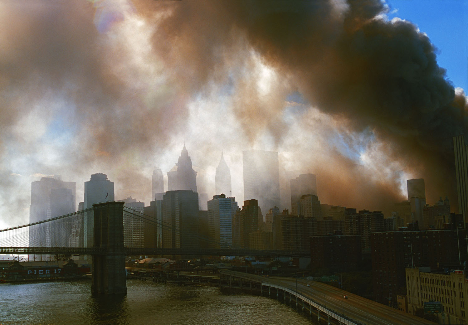 New York, NY, September 11, 2001. View from the Manhattan bridge towards the Brooklyn Bridge and downtown Manhattan during the aftermath of World Trade Center attacks.

