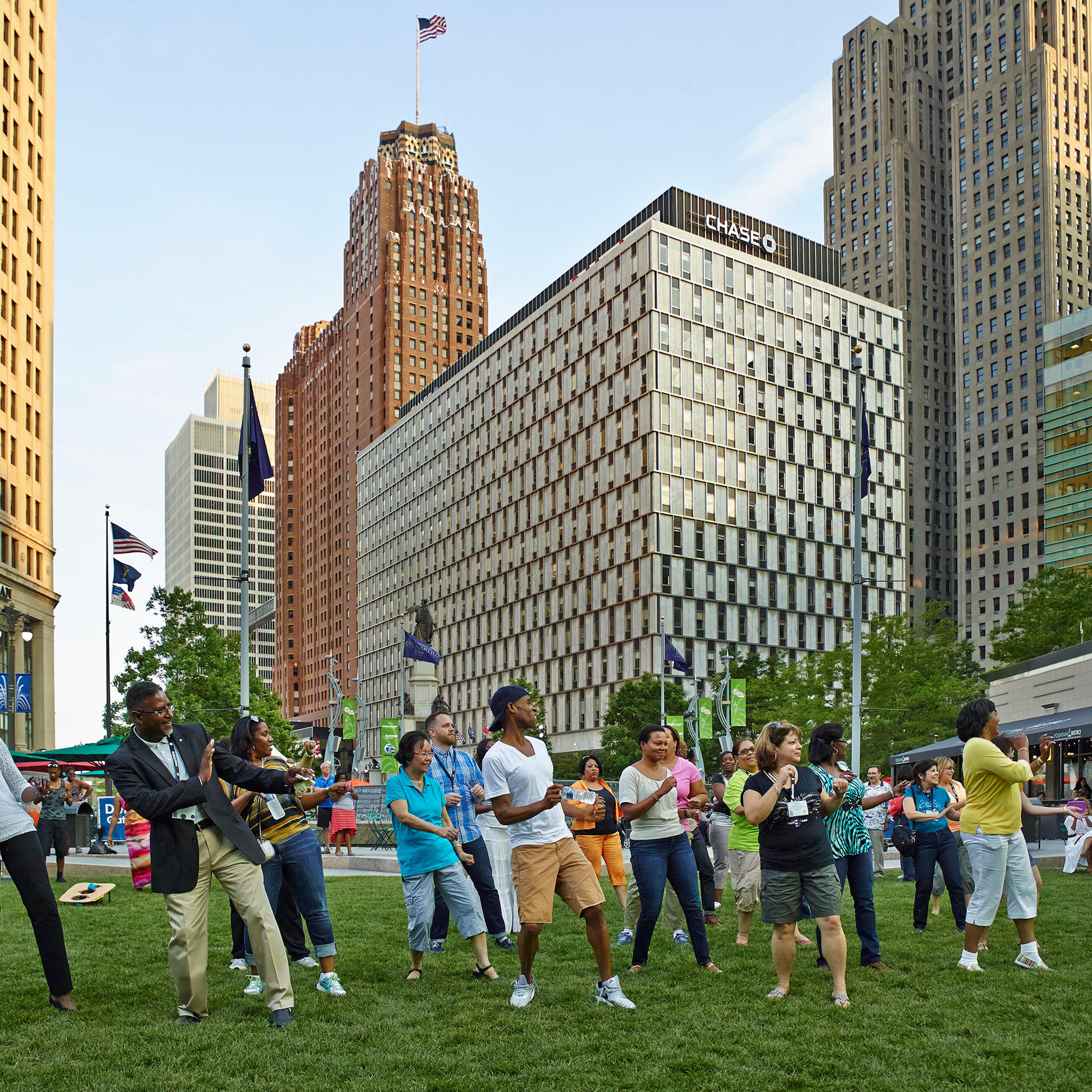A group of diversity activists celebrate at a downtown Detroit park