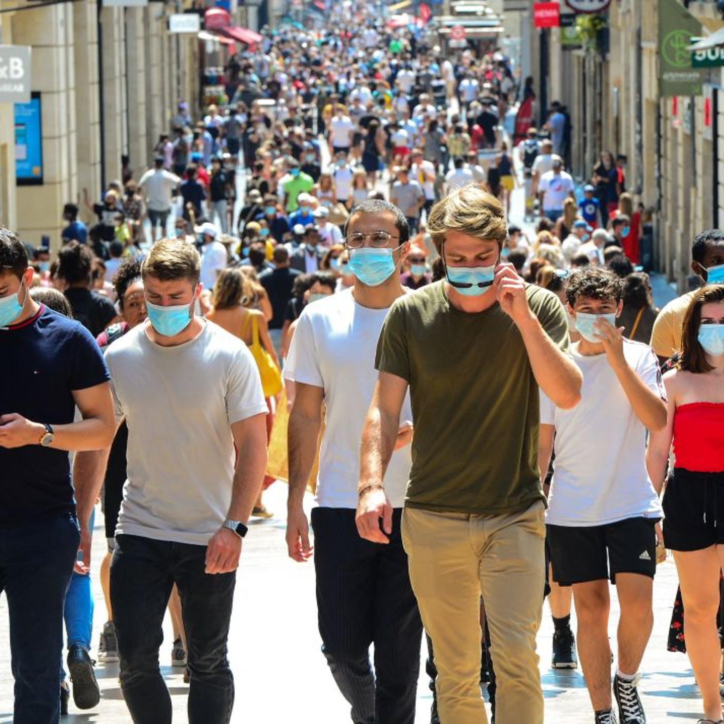 People on the street wearing face masks
