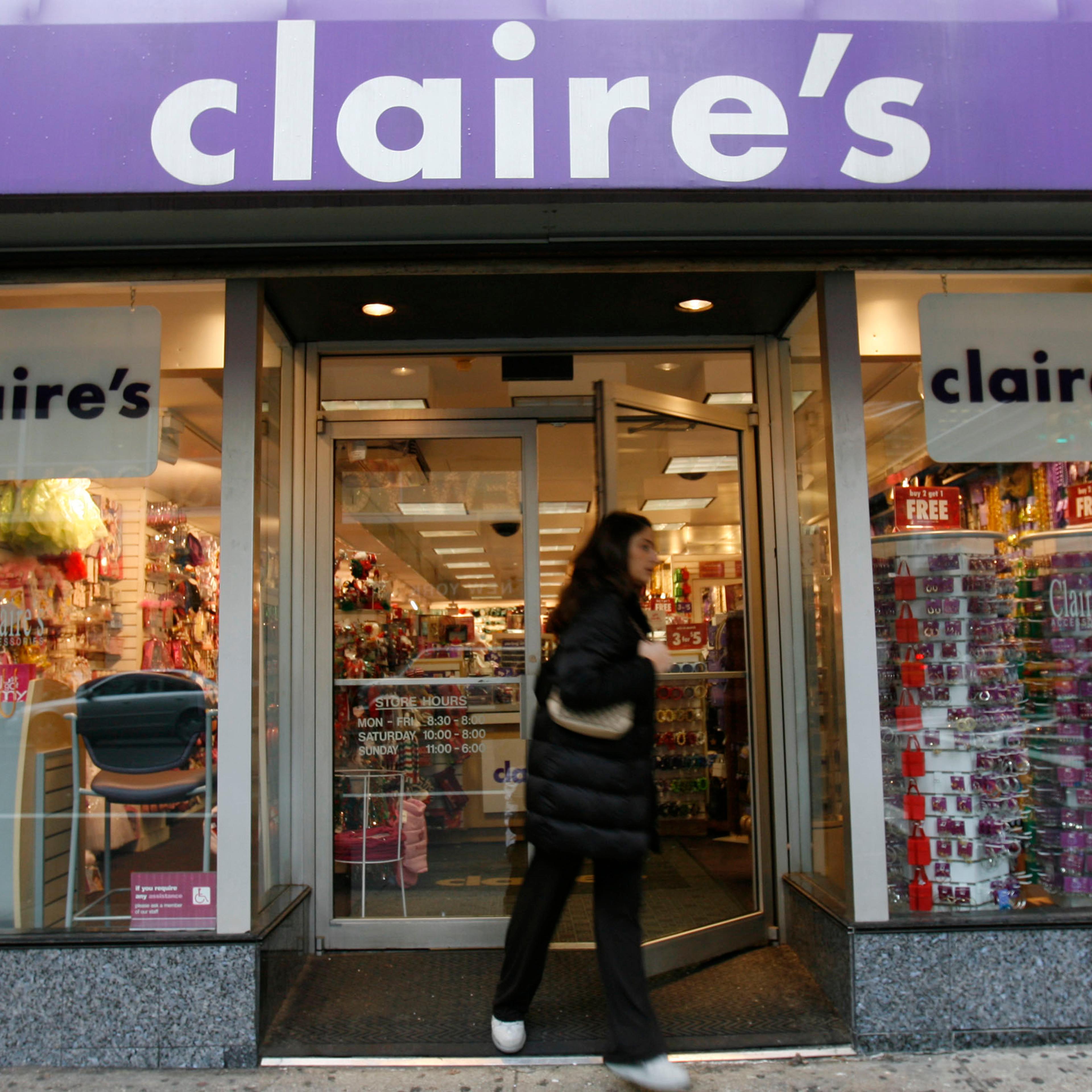 A woman exits a Claire's store on Friday, December 1, 2006 i