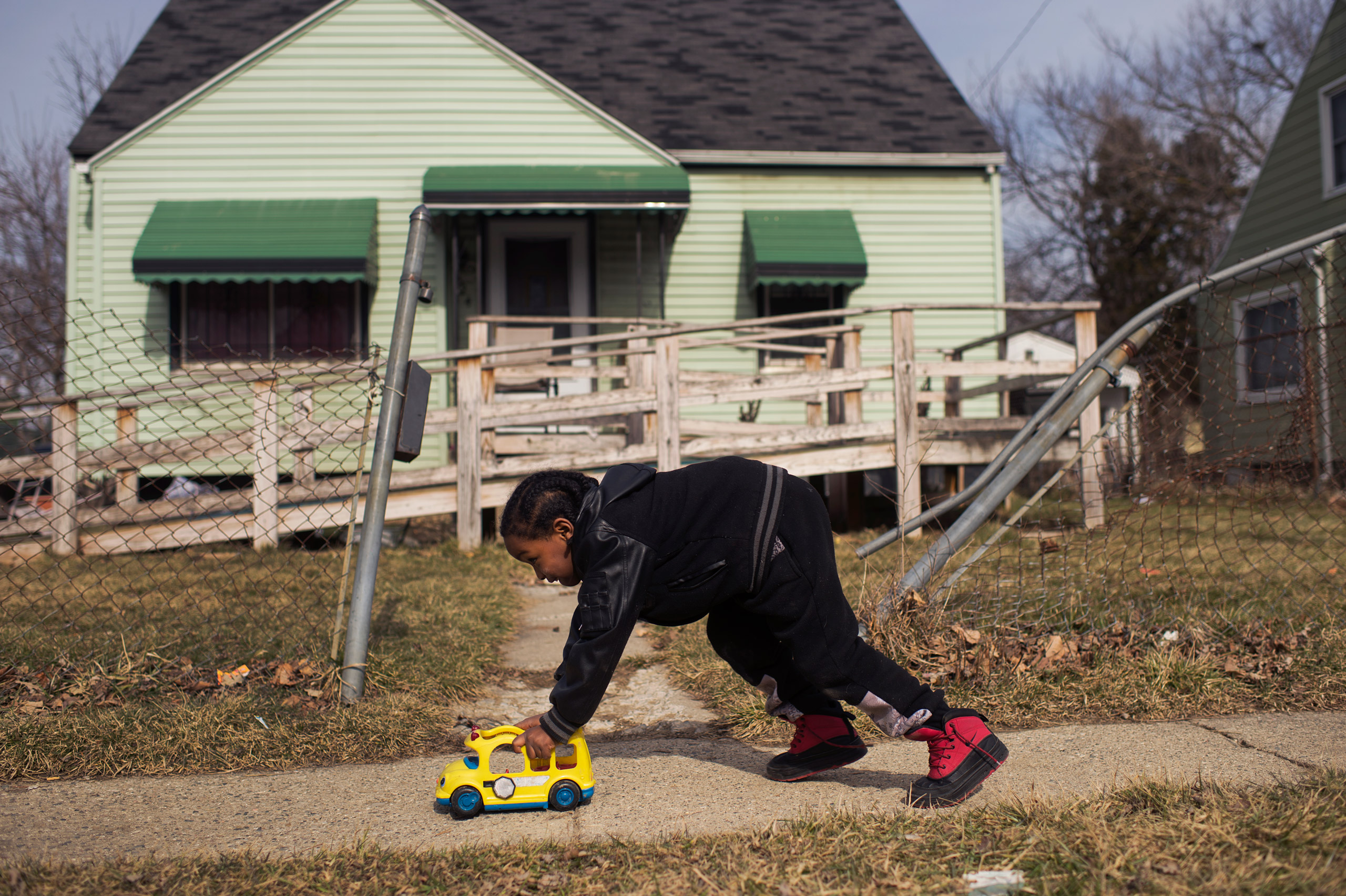 UNITED STATES - FEBRUARY 23: Davarious Griffin, 5, who has had elevated levels of lead detected in his blood, plays outside of his house on Ridgeway Avenue in Flint, Mich., February 23, 2016. The water supply was not properly treated after being switched
