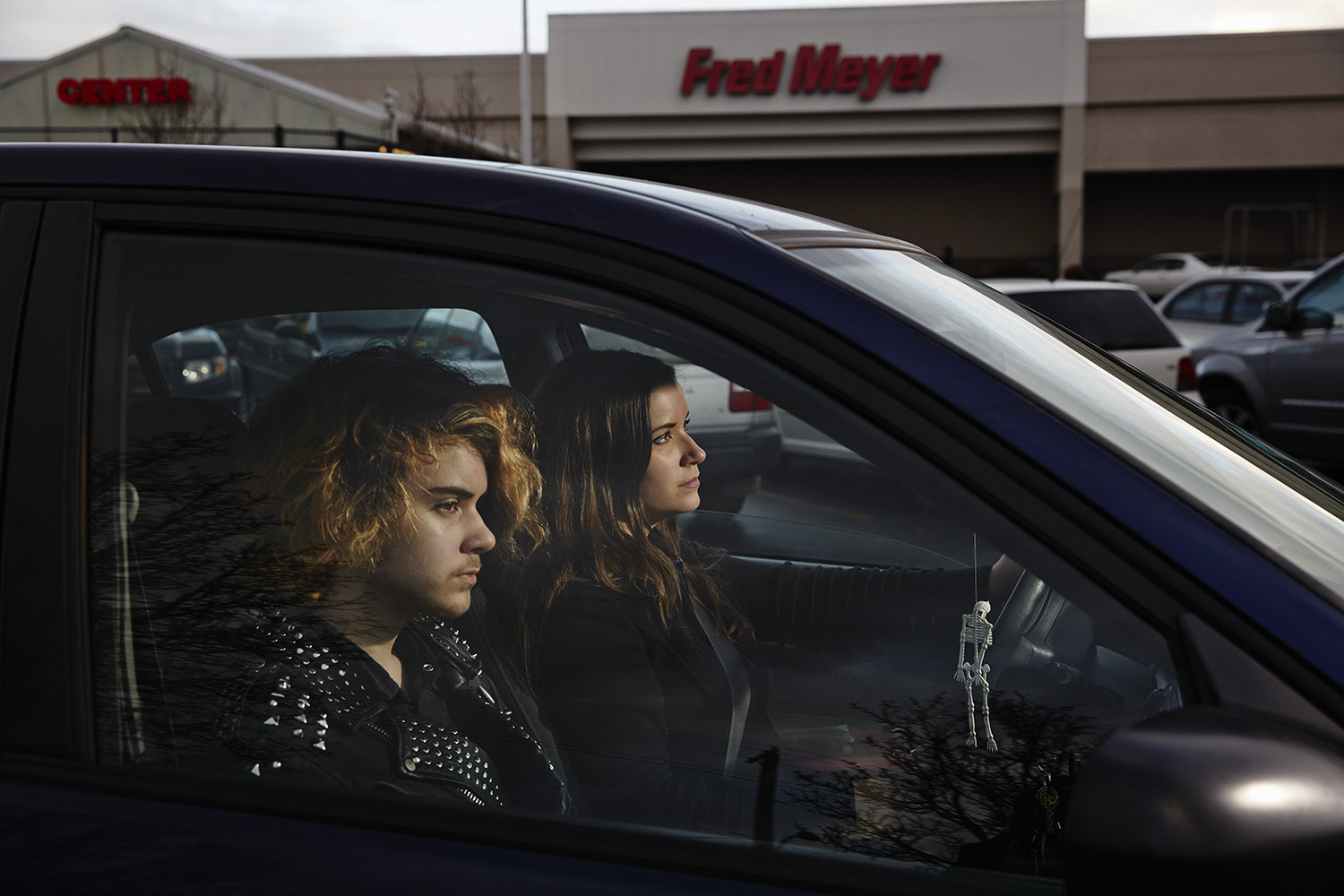 Carly Poe, and her 14-year-old son Julian, Portland, Ore. Before the cut, she was receiving $240/month in SNAP benefits. Now she receives $220/month.