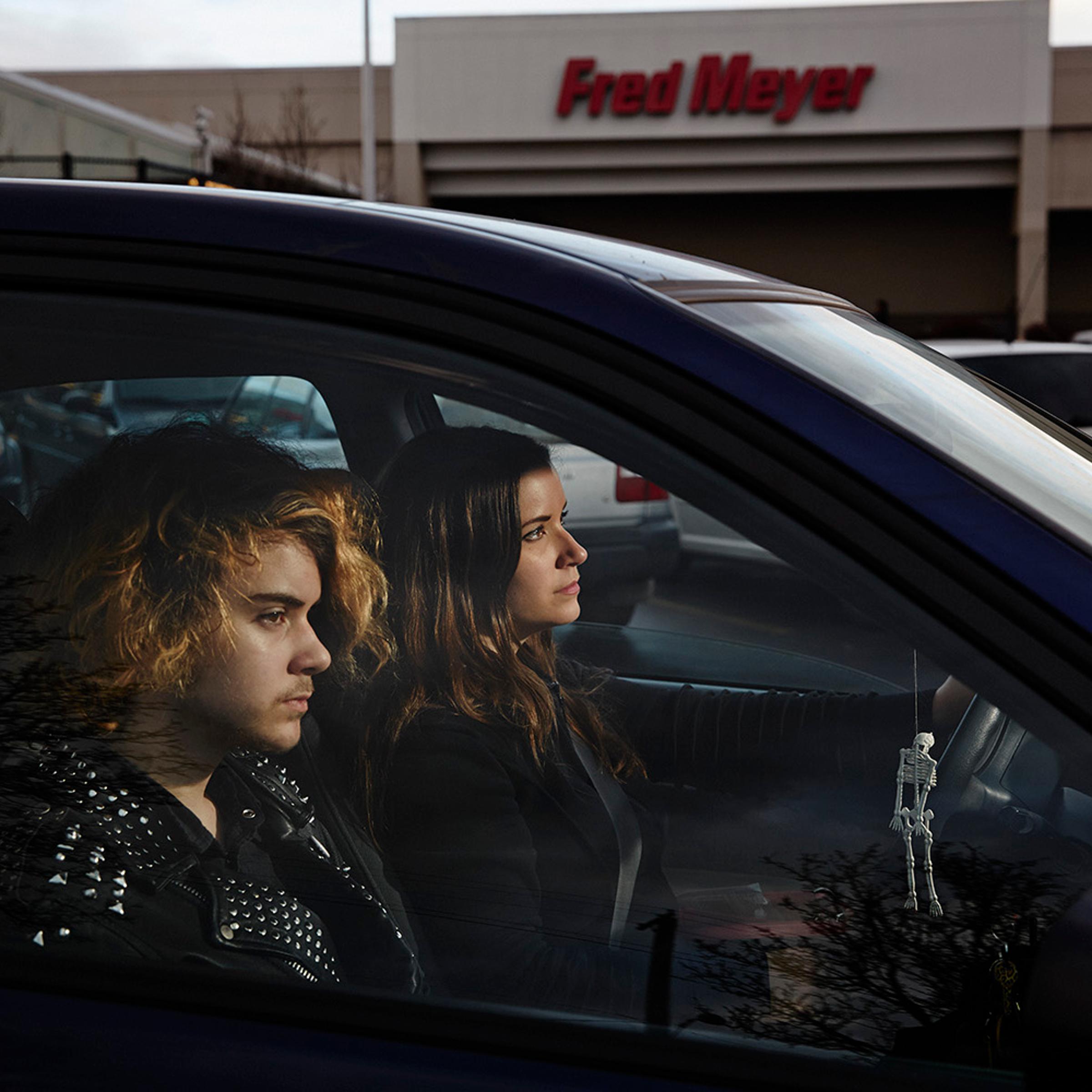 Carly Poe, and her 14-year-old son Julian, Portland, Ore. Before the cut, she was receiving $240/month in SNAP benefits. Now she receives $220/month.