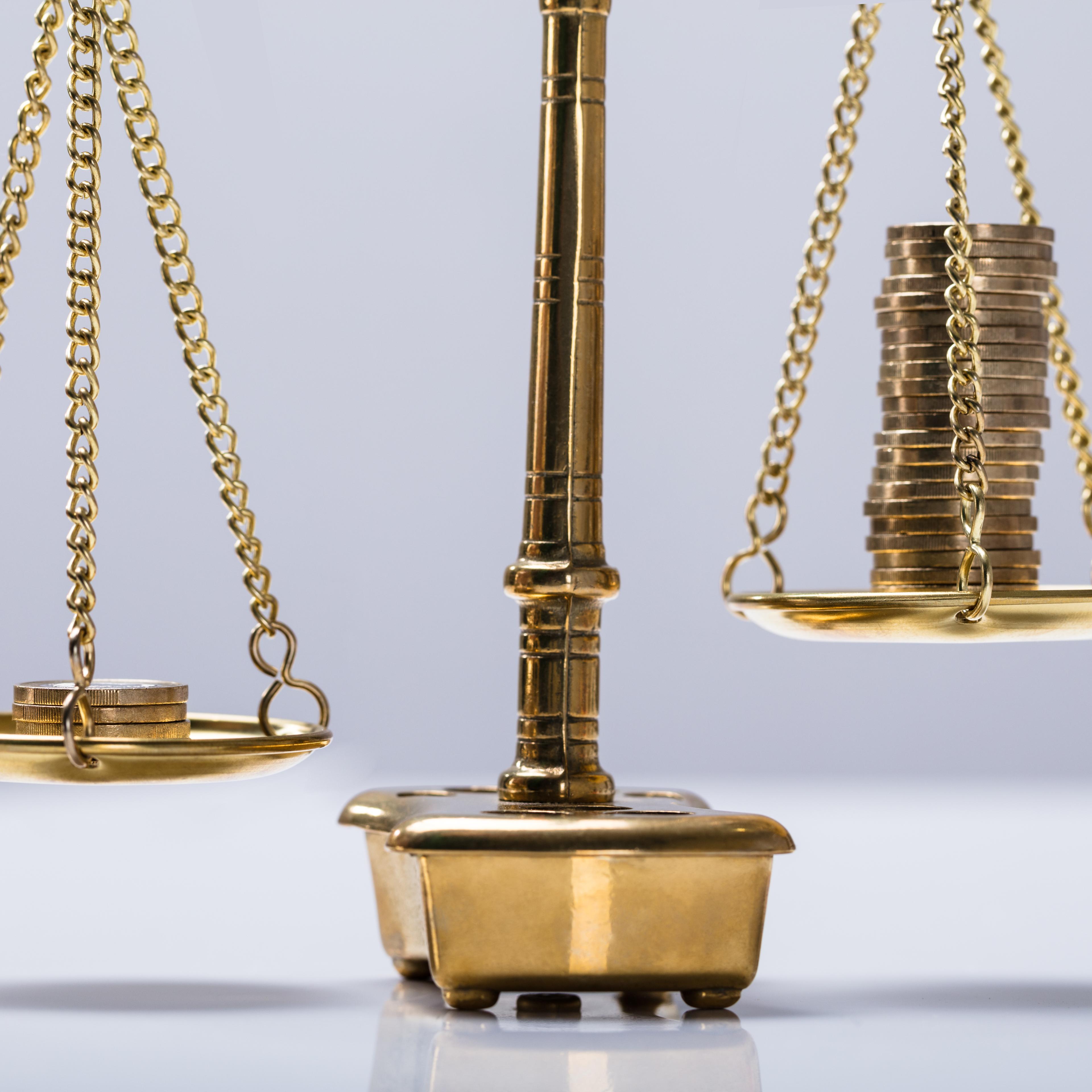 Balancing coins on a scale