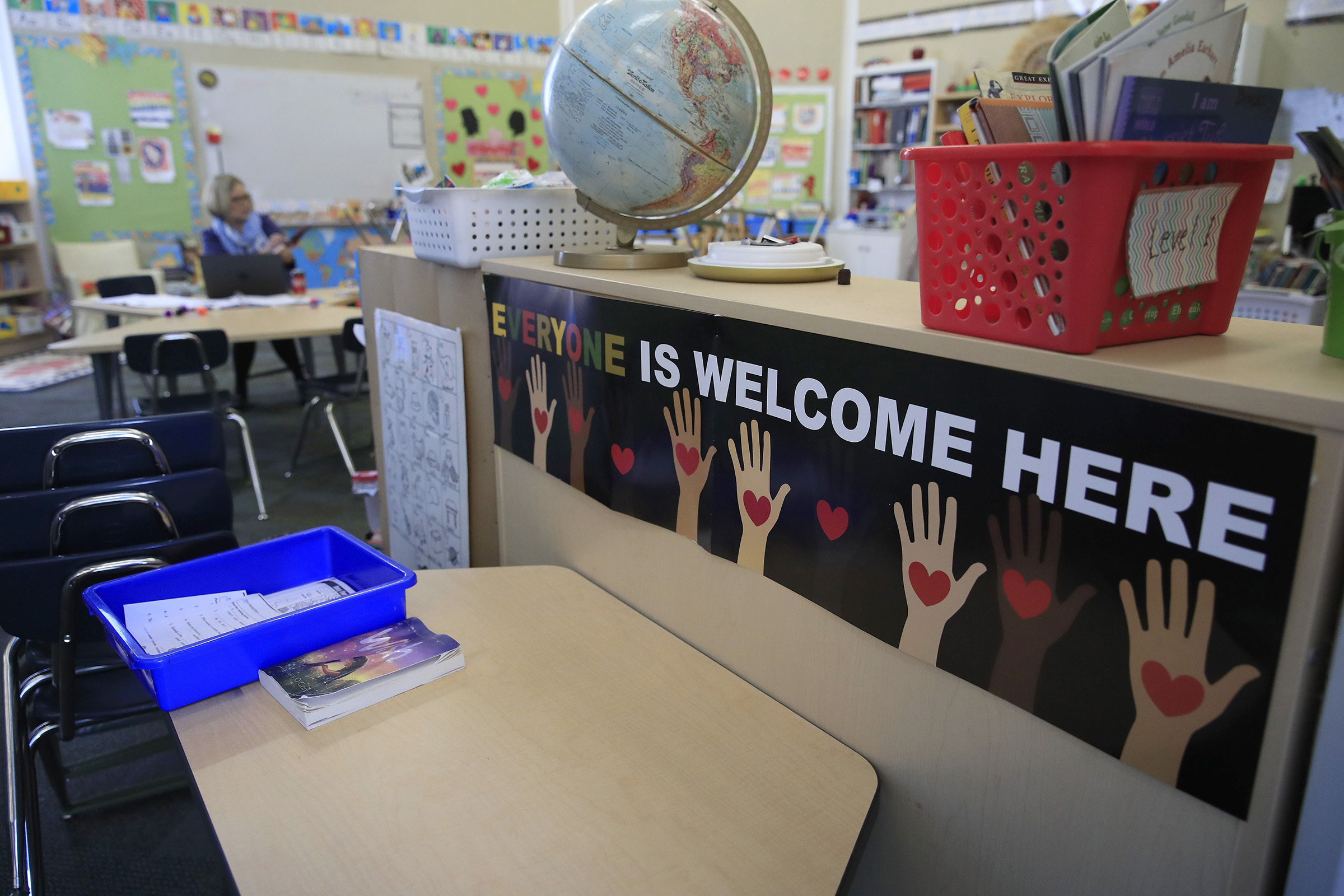 Teacher Instructs Remotely From Empty Classroom
