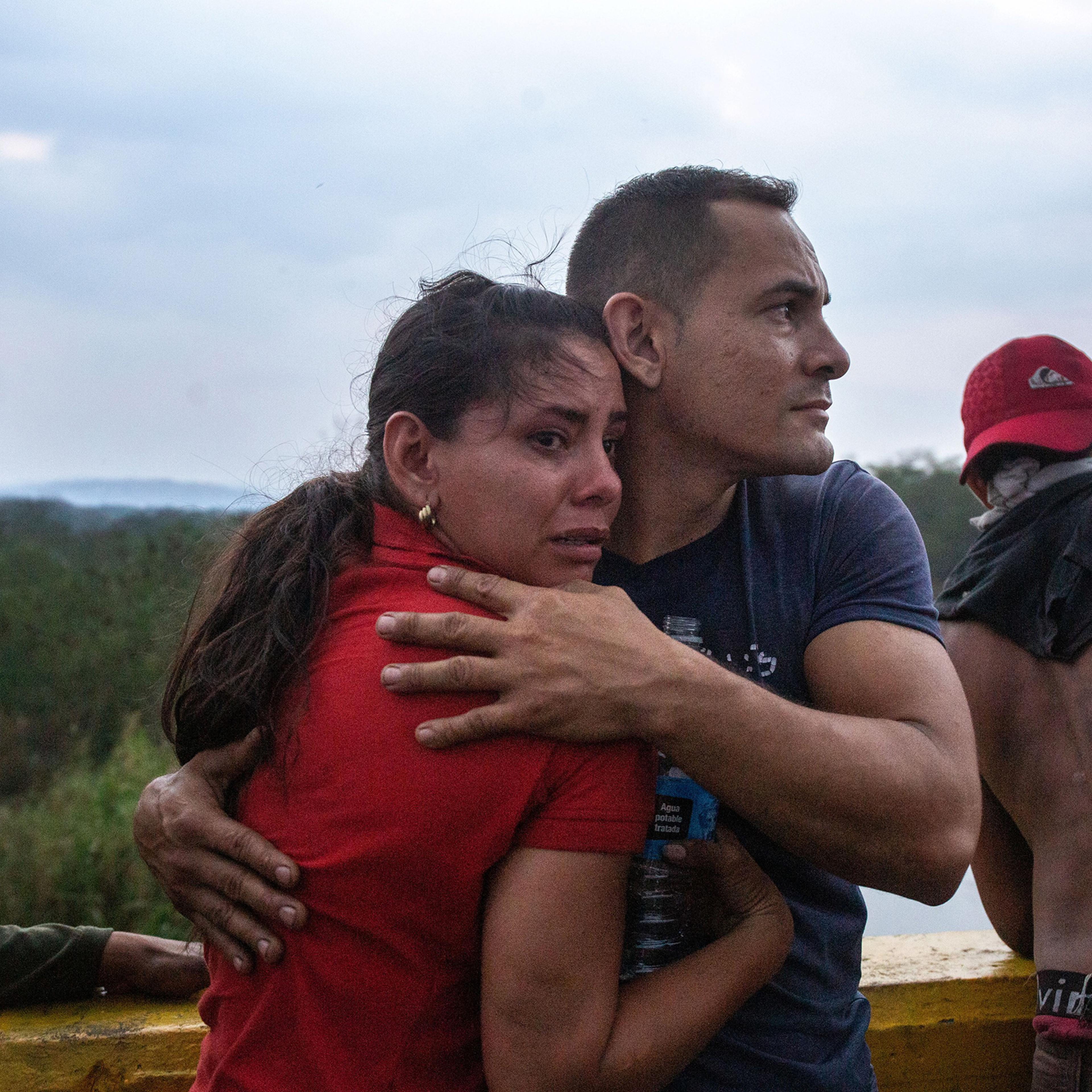 Opposition demonstrators on a bridge that connects Colombia and Venezuela, near the town of Ureña, on Feb. 23