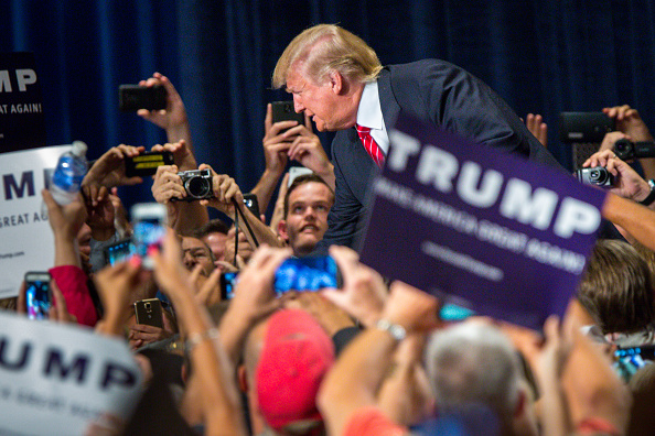 Republican Presidential candidate Donald Trump addresses supporters during a political rally at the Phoenix Convention Center on July 11, 2015 in Phoenix, Arizona.