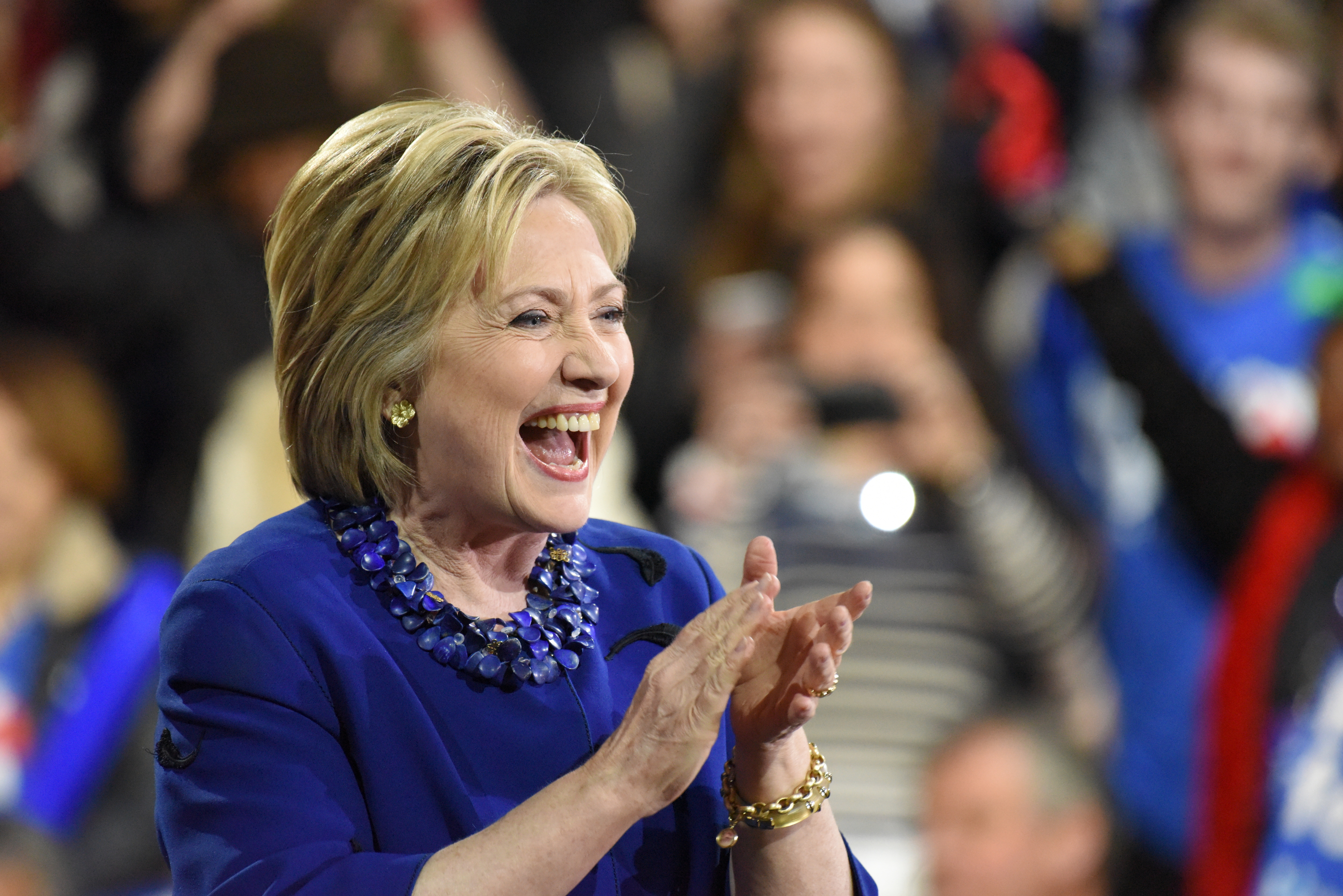 Clinton laughs during remarks spot-lighting her Super Tuesday victory.