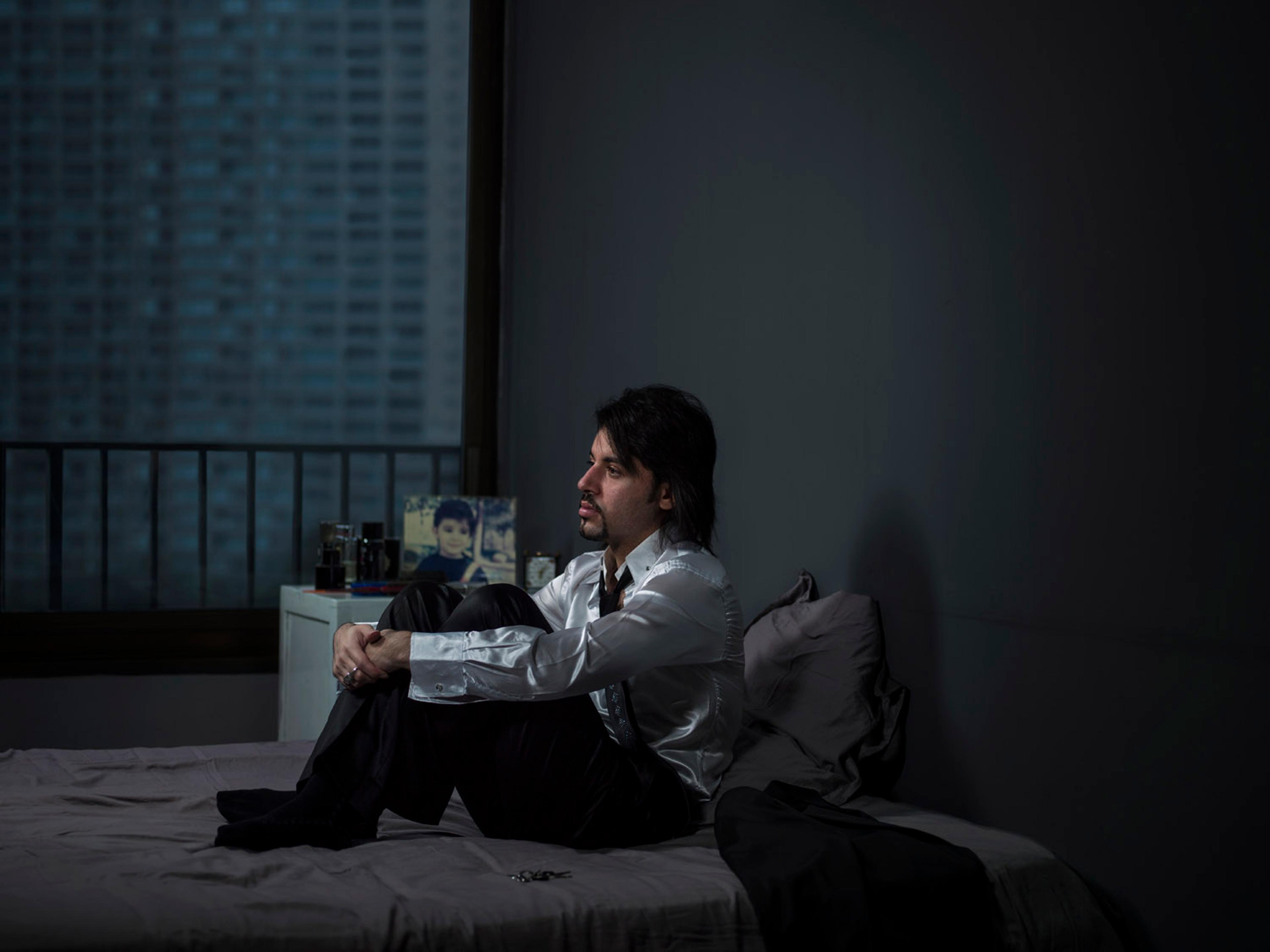 "I have tried to capture a moment of each of their stories within the frame of a window that looks out onto the cold concrete buildings which surround us daily."