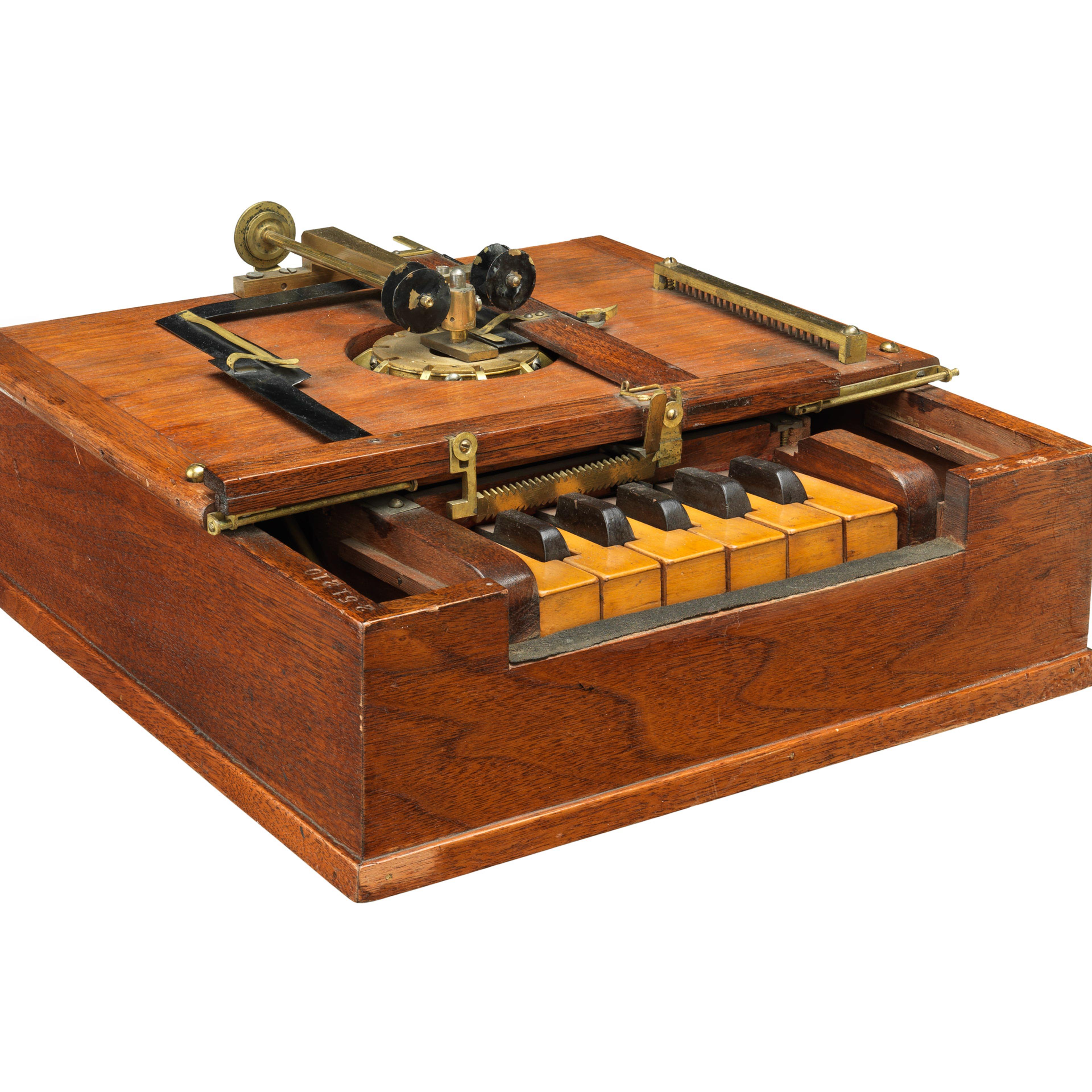 Typewriter, 1868: C. Latham Sholes, Carlos Glidden & Samuel W. Soule (Patent No. 79265).
This patent model was created by the three Milwaukee inventors who made progress towards a viable typewriting machine. Six years later, Remington & Sons produced the first commercially successful machine, bearing the names of Sholes and Glidden.
