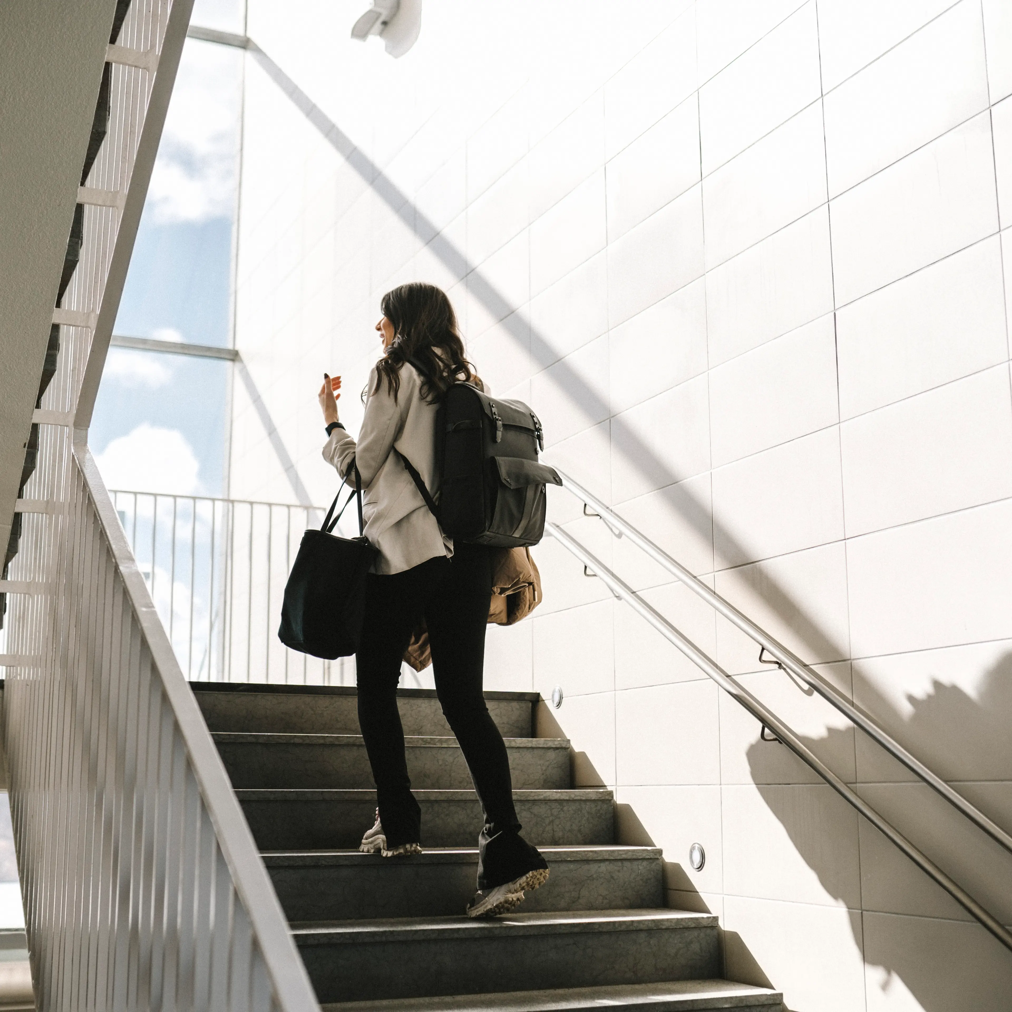 Woman walking up stairs