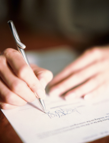 hand-signing-signature-document