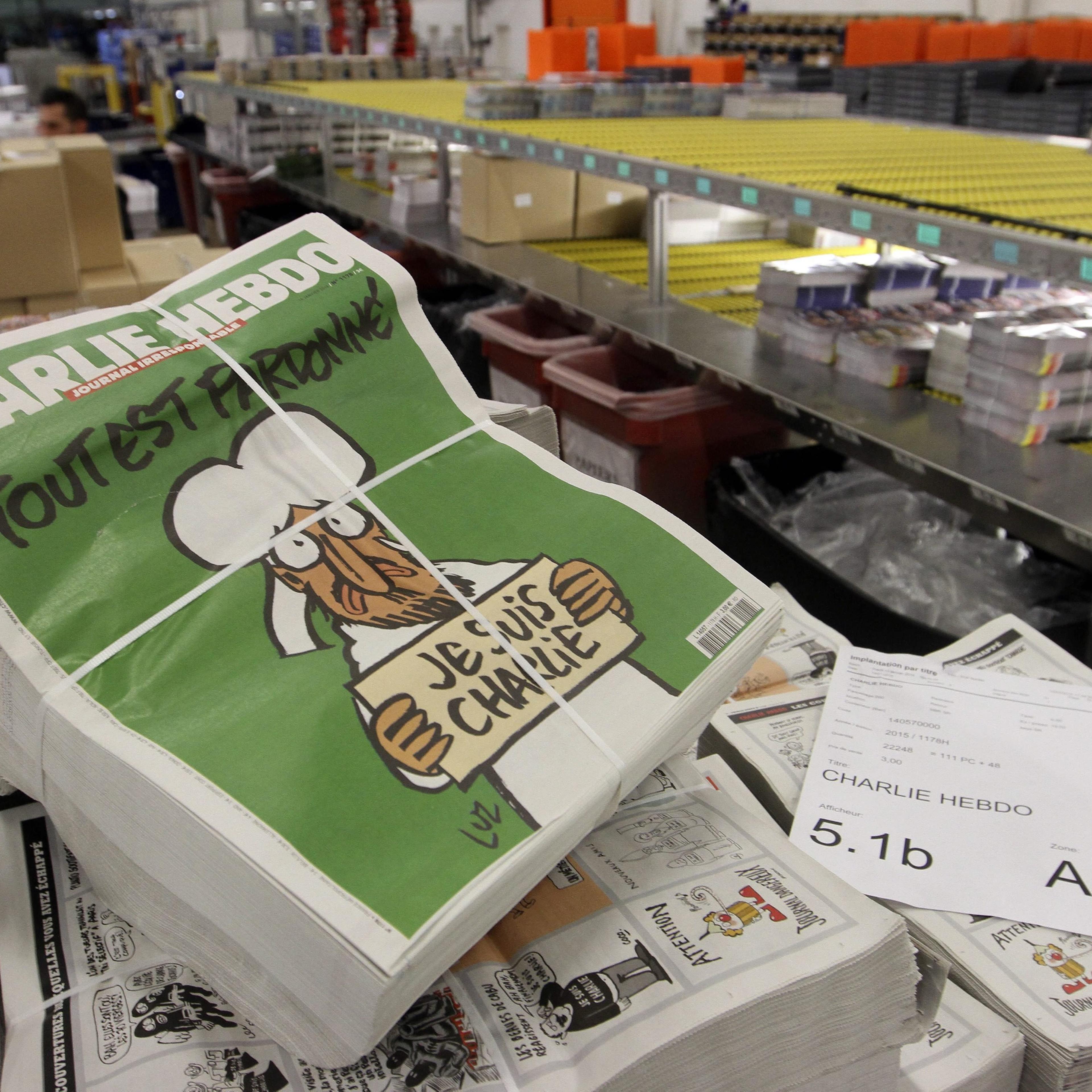 Copies of the upcoming edition of the French satirical magazine Charlie Hebdo are stacked at a distribution centre in Nantes, France, on Jan 13, 2014.