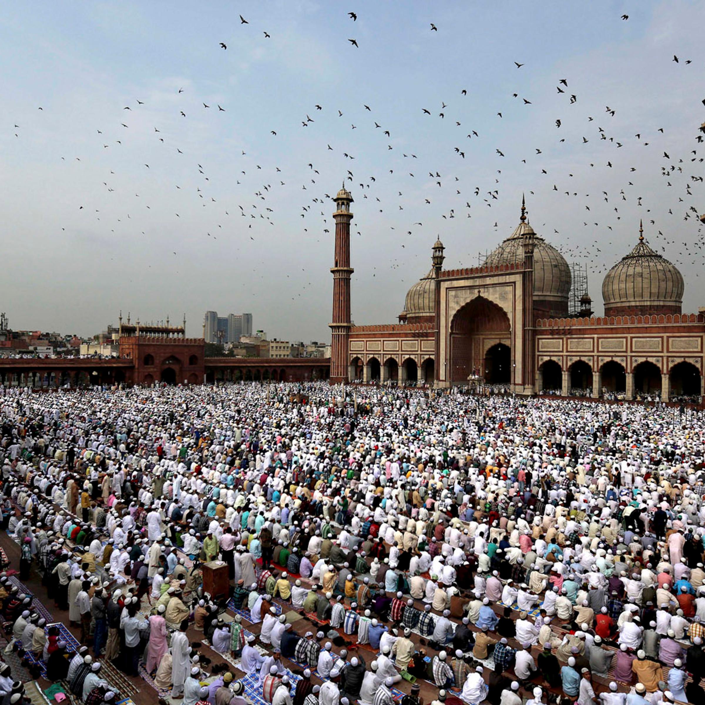 Aug. 20, 2012. Indian Muslims take part in Eid al-Fitr prayers at Jama Masjid in New Delhi.