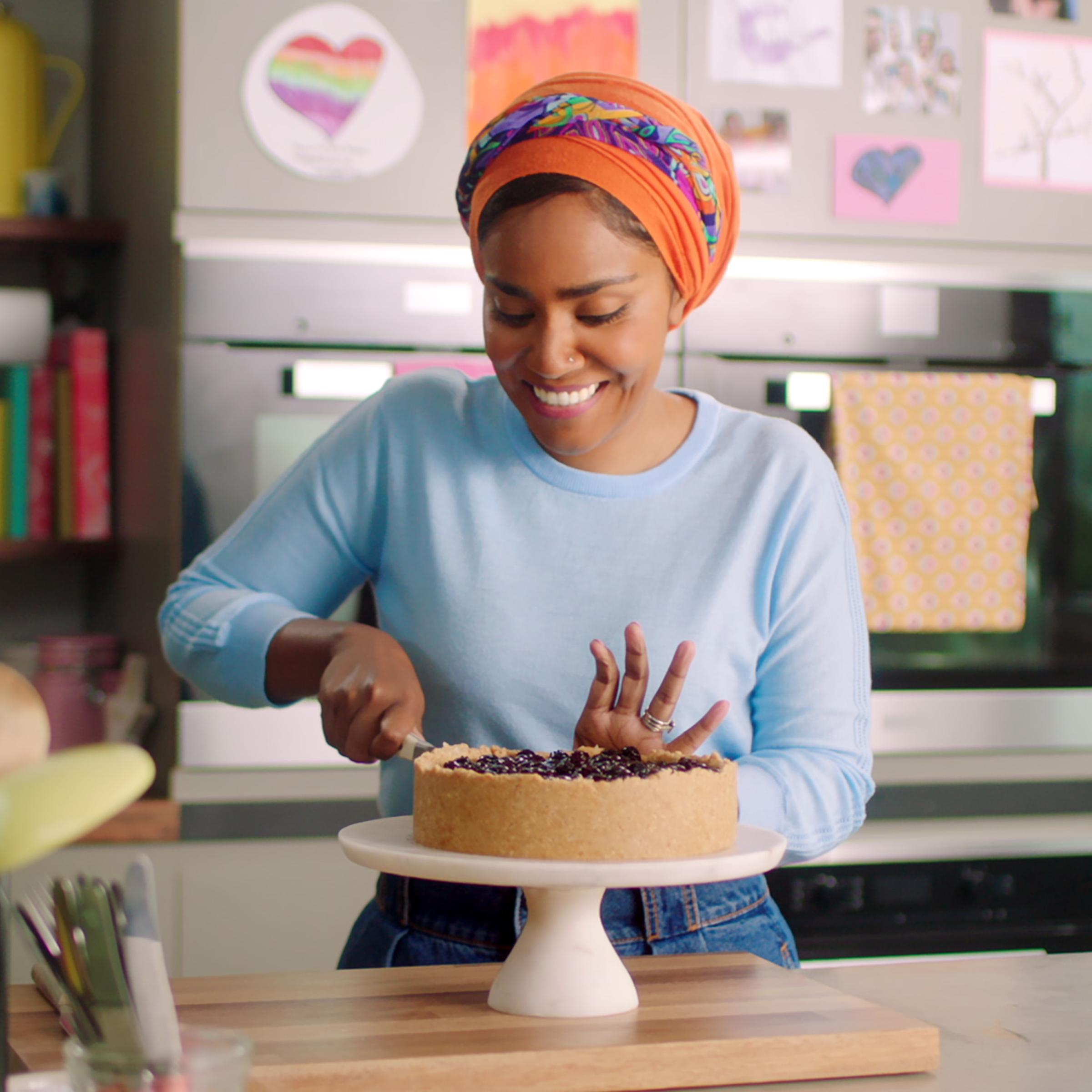 Nadiya Hussain in episode 2 “Indulgent Desserts” of Nadiya Bakes: Season 1. c. Courtesy of Netflix © 2021