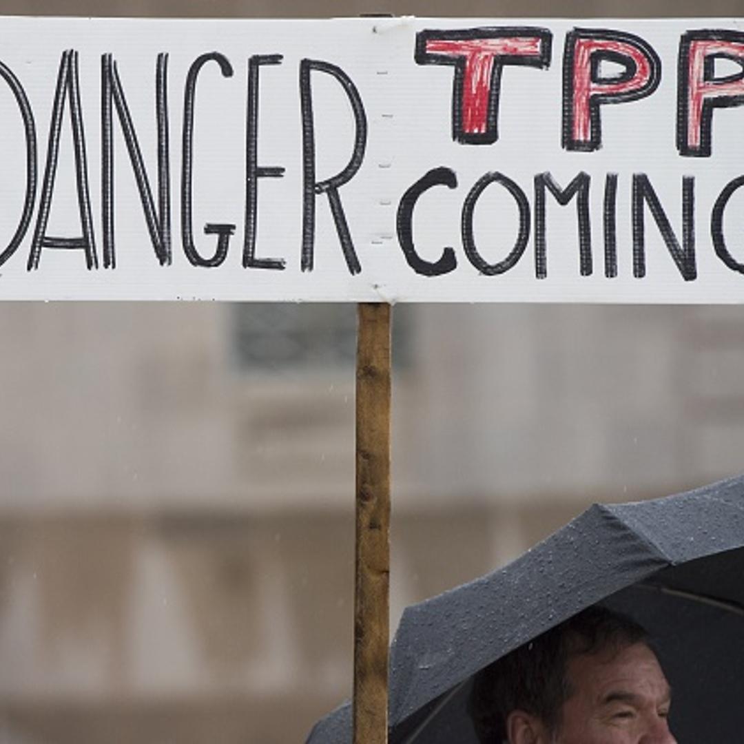 Demonstrators protest against the legislation to give President Barack Obama fast-track authority to advance trade deals, including the Trans-Pacific Partnership (TPP), during a protest march on Capitol Hill in Washington, DC, May 21, 2015.
