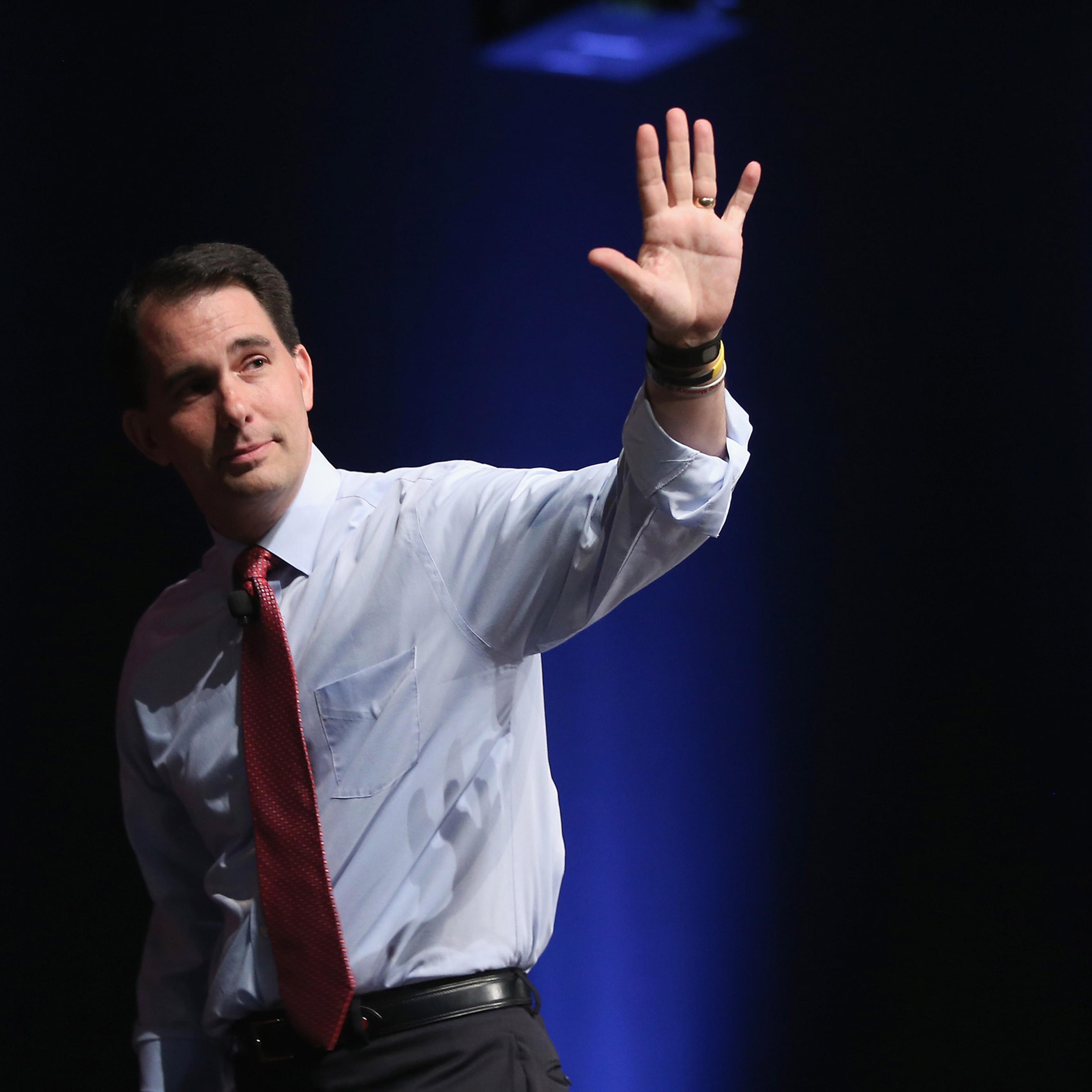 AMES, IA - JULY 18: Republican presidential candidate Wisconsin Governor Scott Walker greets guests at The Family Leadership Summit at Stephens Auditorium on July 18, 2015 in Ames, Iowa. According to the organizers, the purpose of The Family Leadership S