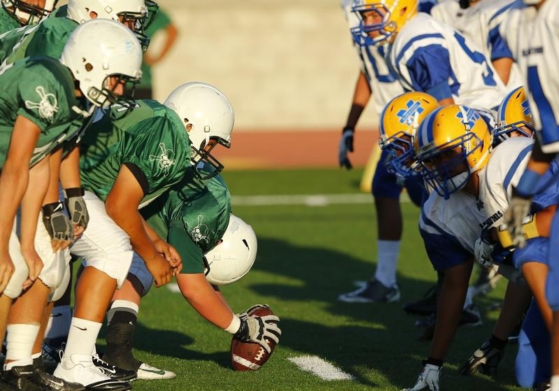 Oceanside Pirates junior varsity team line up against the Mira Mesa Junior varsity team as they play high school football in Oceanside