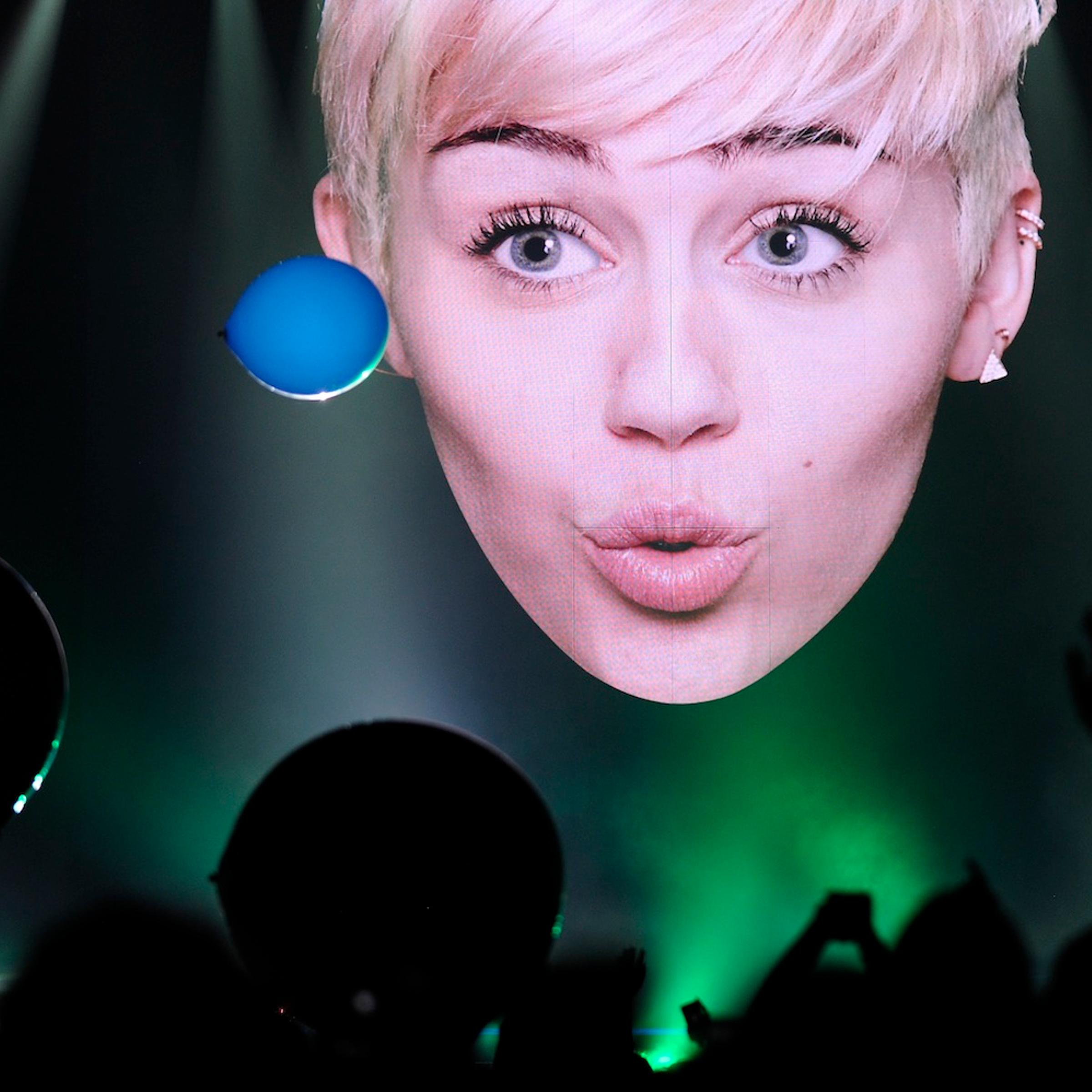 Miley Cyrus performs in Denver during a stop on her Bangerz Tour on Mar. 4, 2014