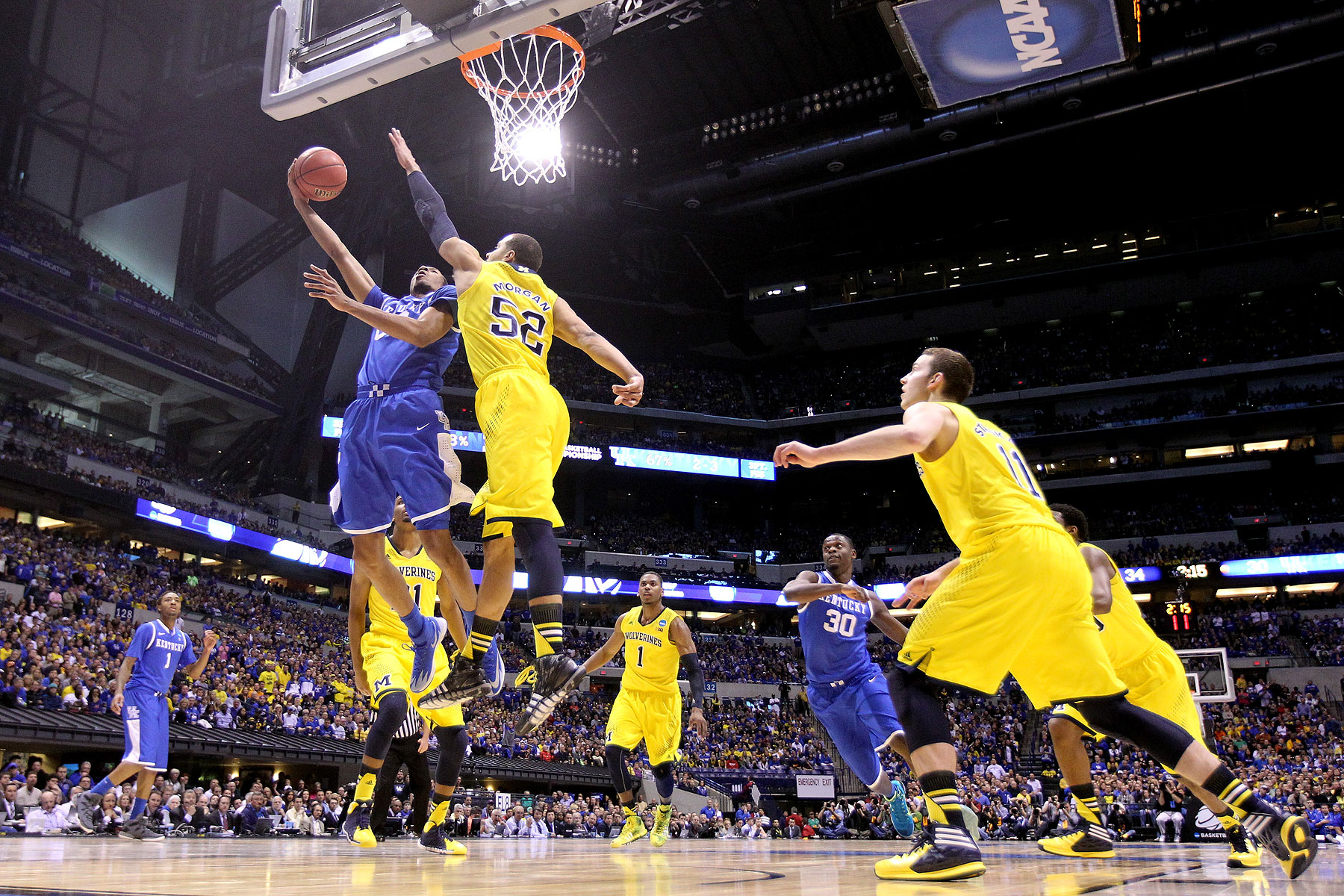 Marcus Lee of the Kentucky Wildcats shoots the ball against the Michigan Wolverines during the midwest regional final of the 2014 NCAA Men's Basketball Tournament at Lucas Oil Stadium on March 30, 2014 in Indianapolis, Indiana