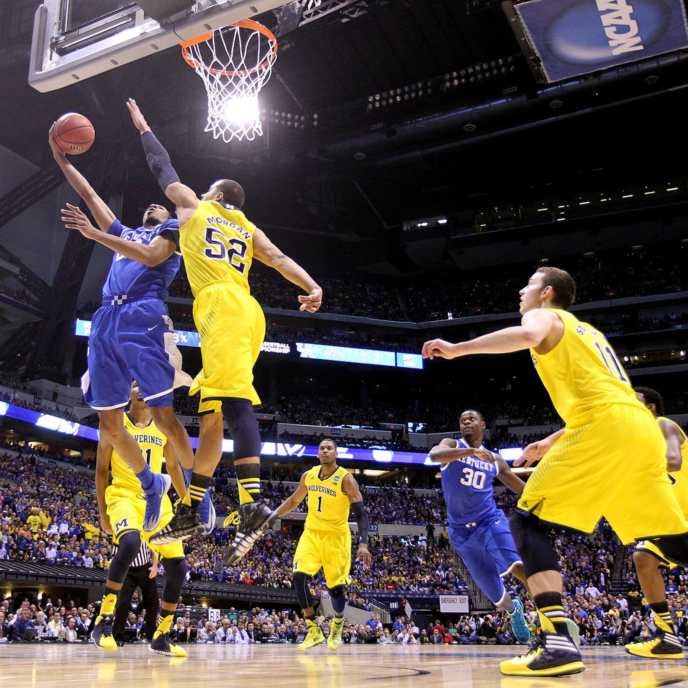 Marcus Lee of the Kentucky Wildcats shoots the ball against the Michigan Wolverines during the midwest regional final of the 2014 NCAA Men's Basketball Tournament at Lucas Oil Stadium on March 30, 2014 in Indianapolis, Indiana