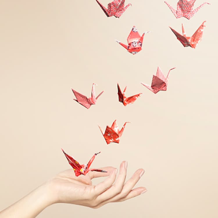 red-origami-cranes-flying